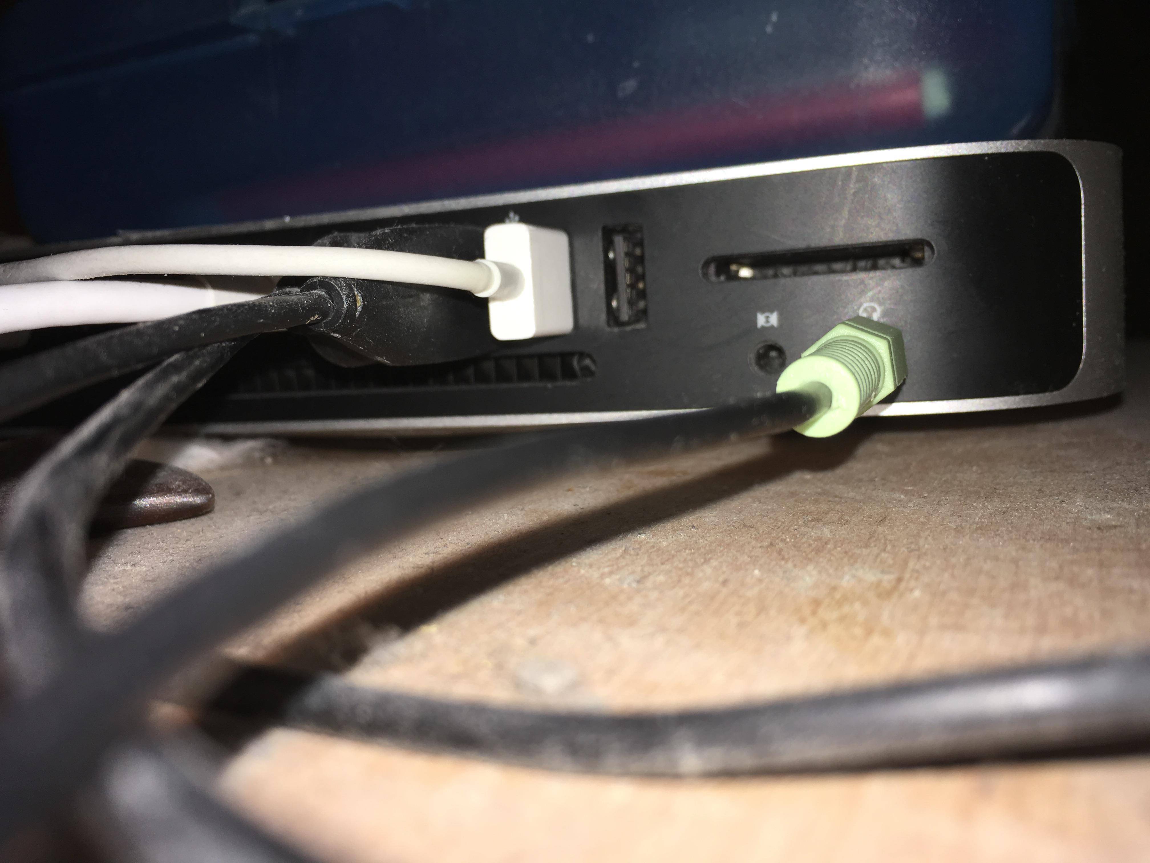 mac mini What's the port left to the audio output? Ask Different