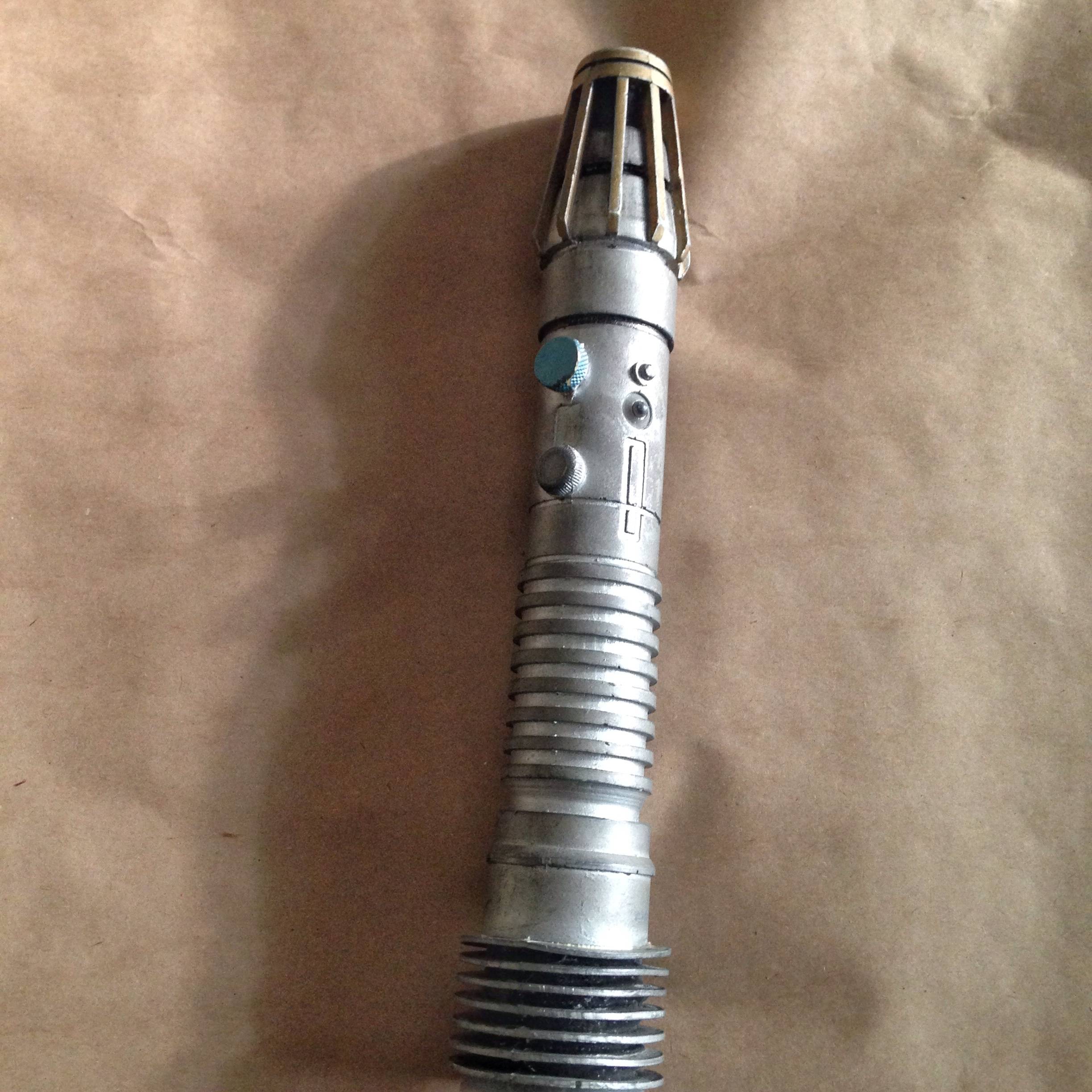 Which character does this "stunt" lightsaber belong to? It appeared in