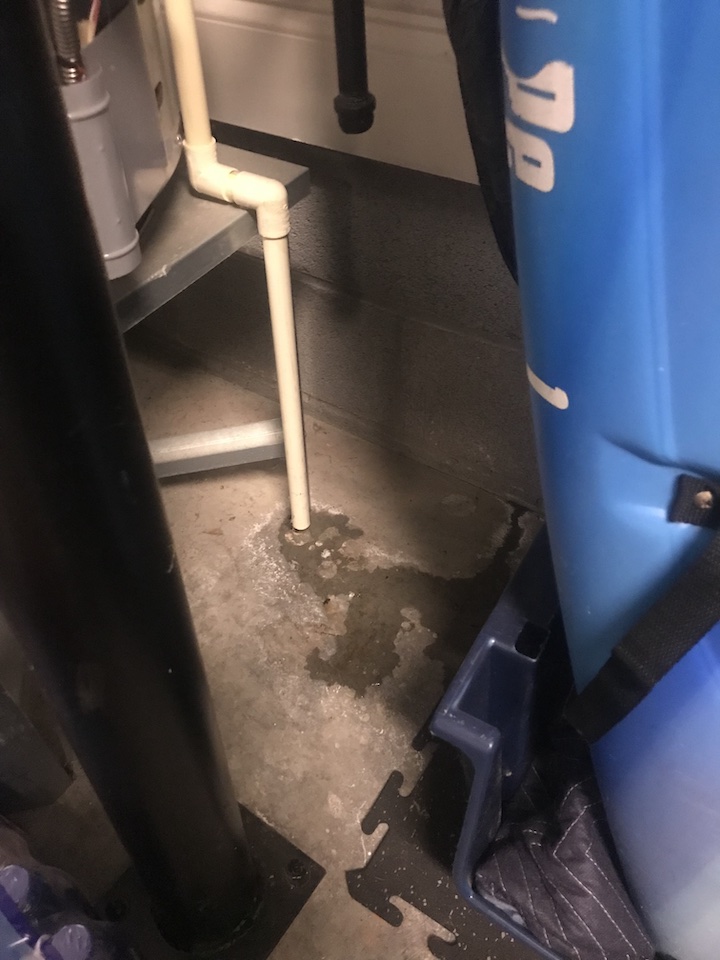 PVC pipe from Water Heater is sending some water into garage floor