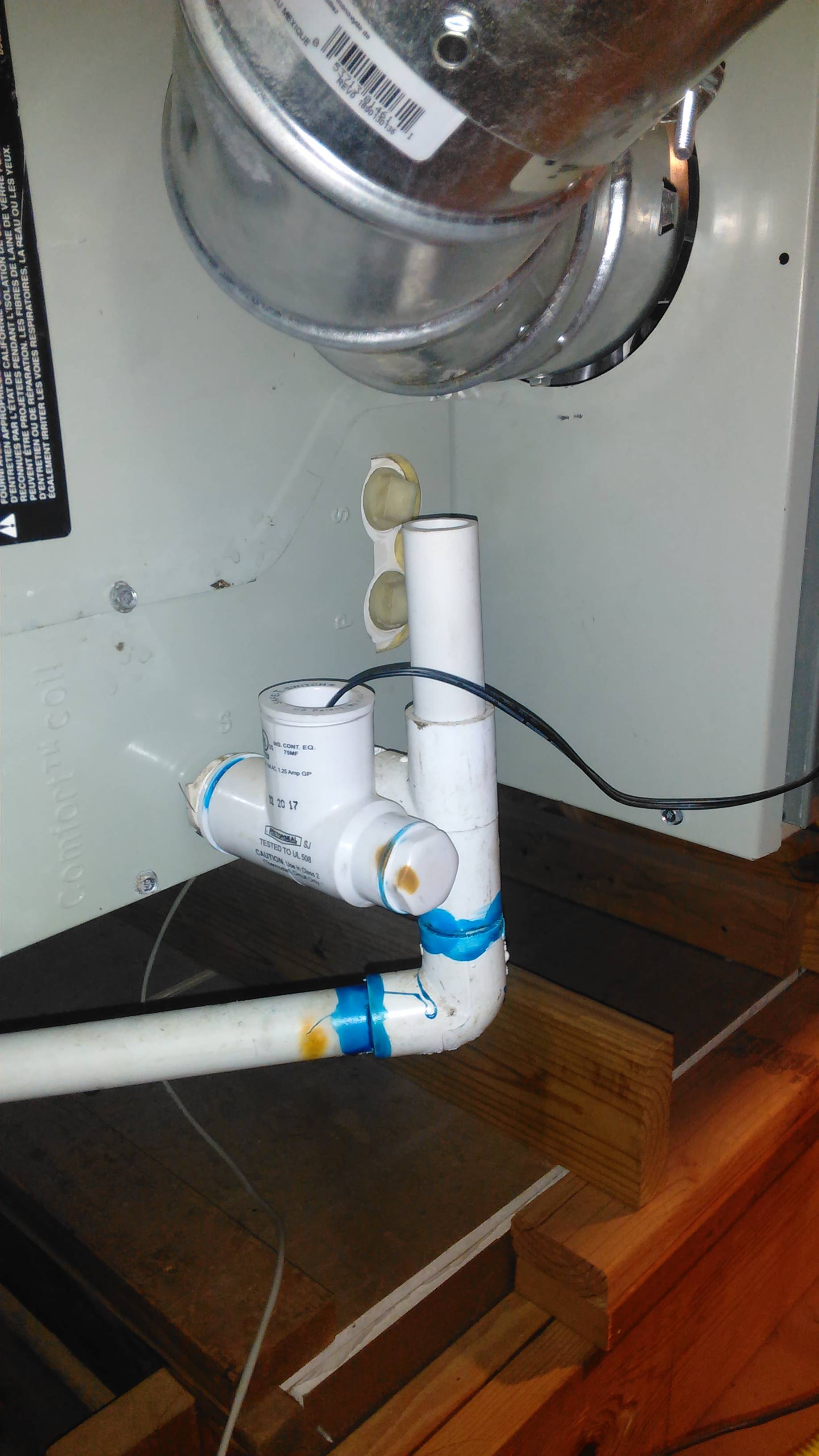 Trane HVAC in horizontal position - why does evaporator throw