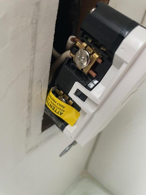 wiring - Oddly wired GFCI plug in my house - is this correct? - Home