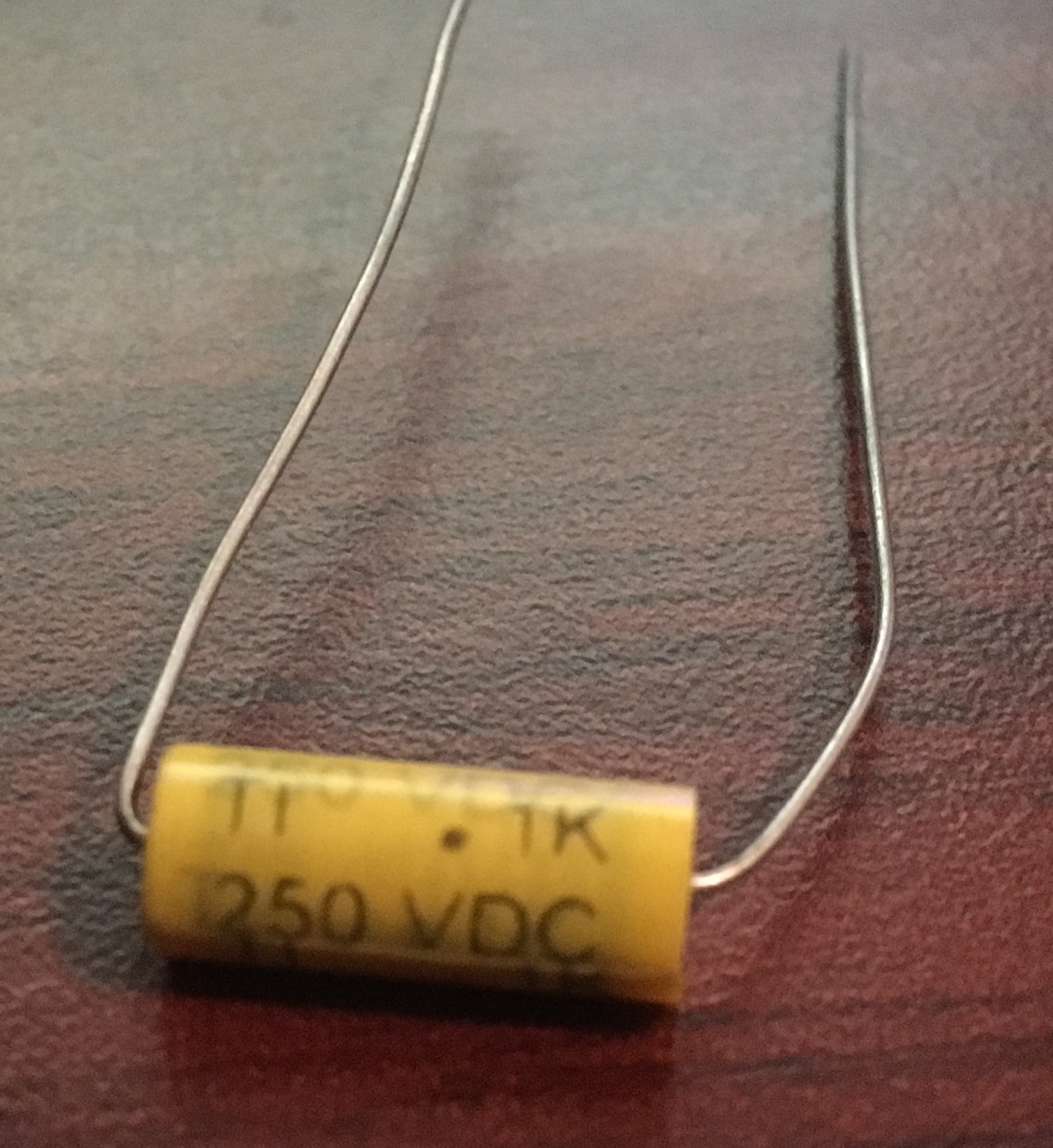 capacitor Trying to understand how a guitar pickup switch works