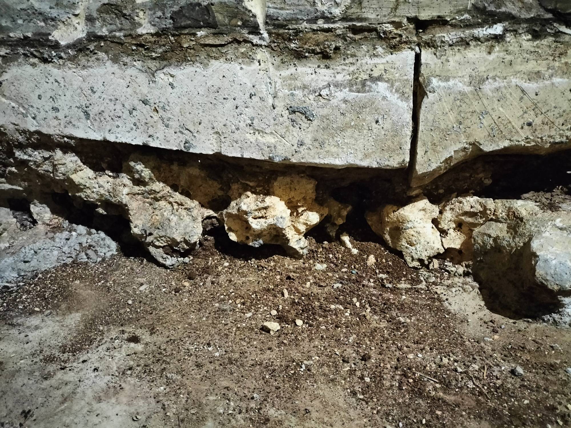 Filling hole in limestone foundation wall with concrete Home