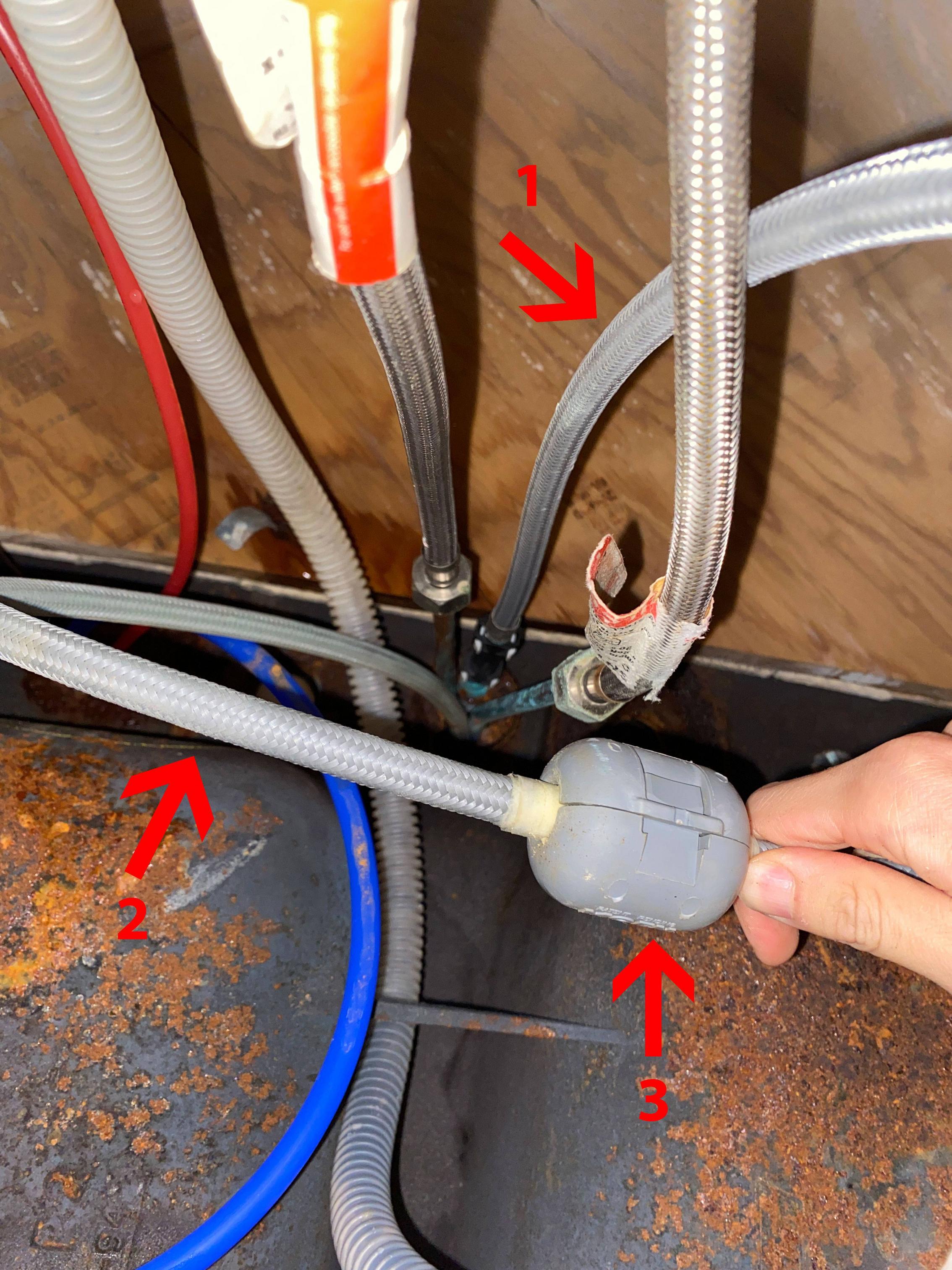 What are these extra tubes underneath the kitchen sink faucet? Home