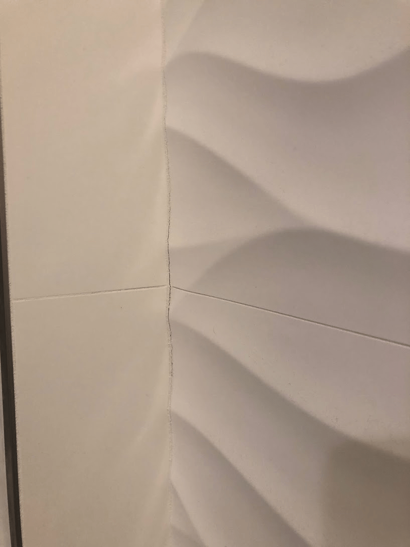 shower How can I fix hairline cracks in brand new grout? Home