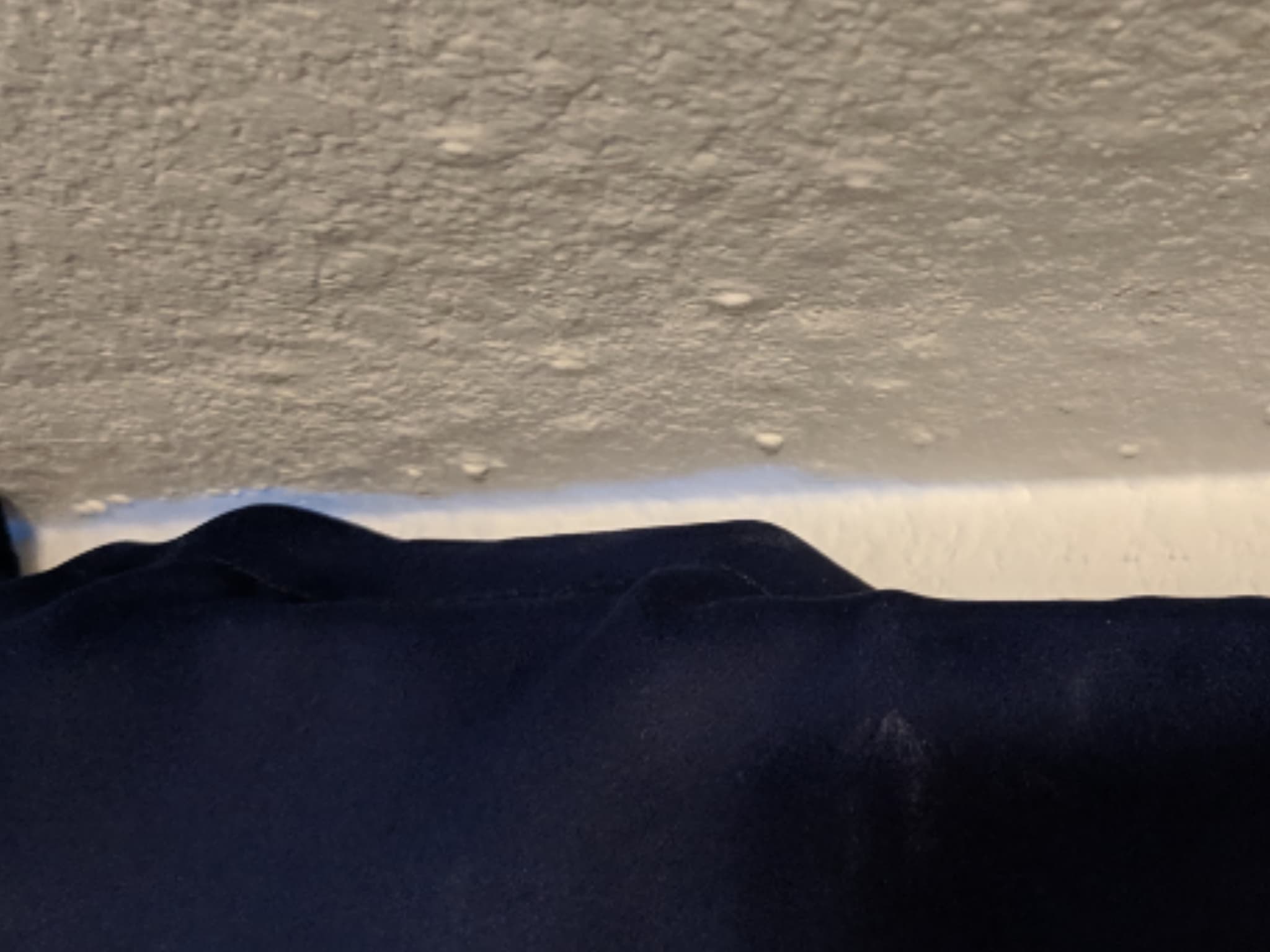 paint Bubbles appearing on middle aged painted drywall Home