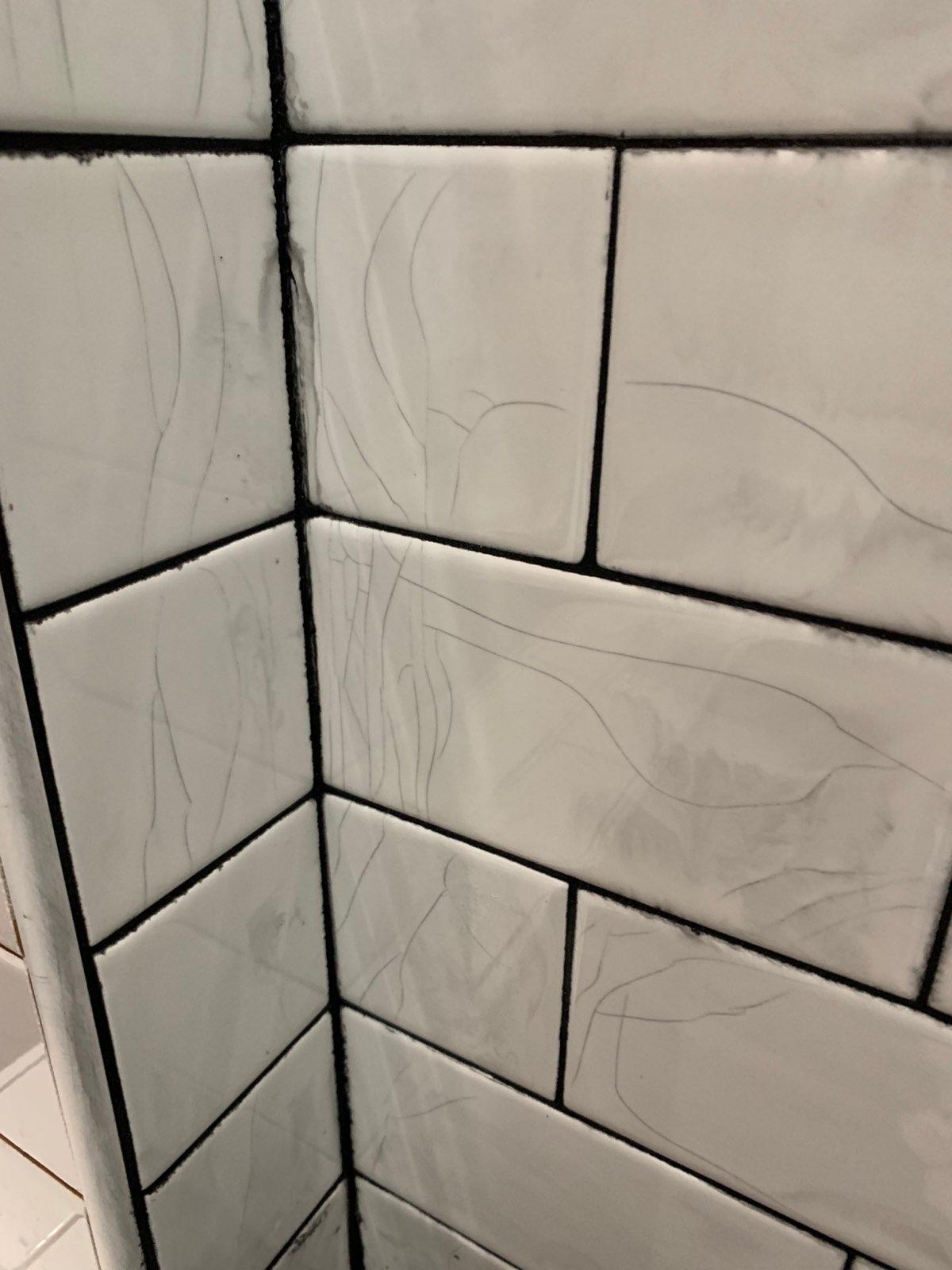 shower Any idea what’s going on here with this subway tile? Home