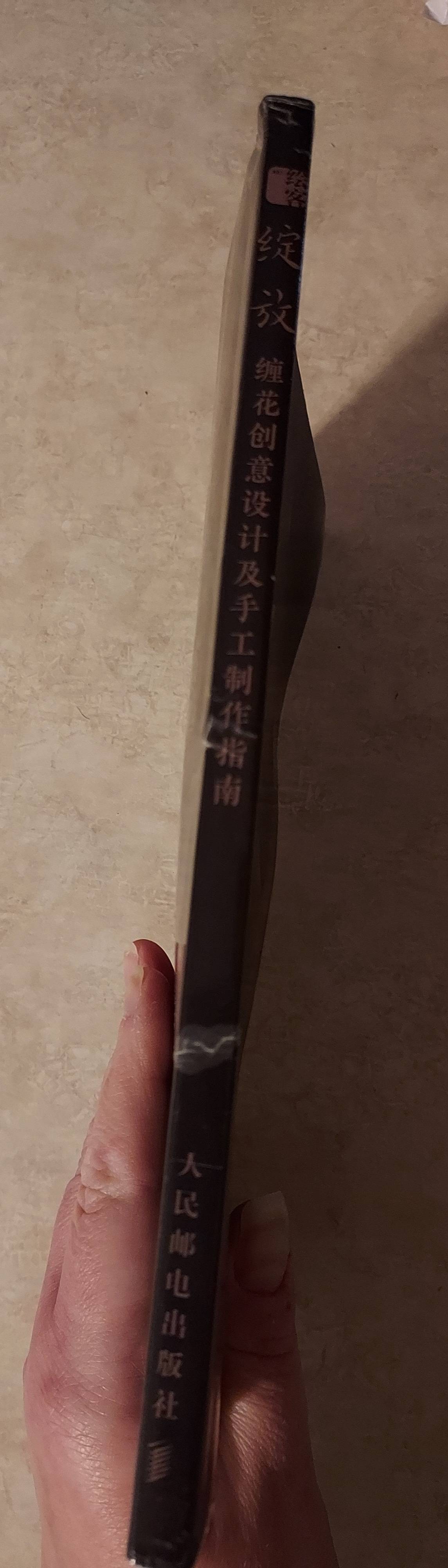 physical books How do I repair warping, creasing, and lamination