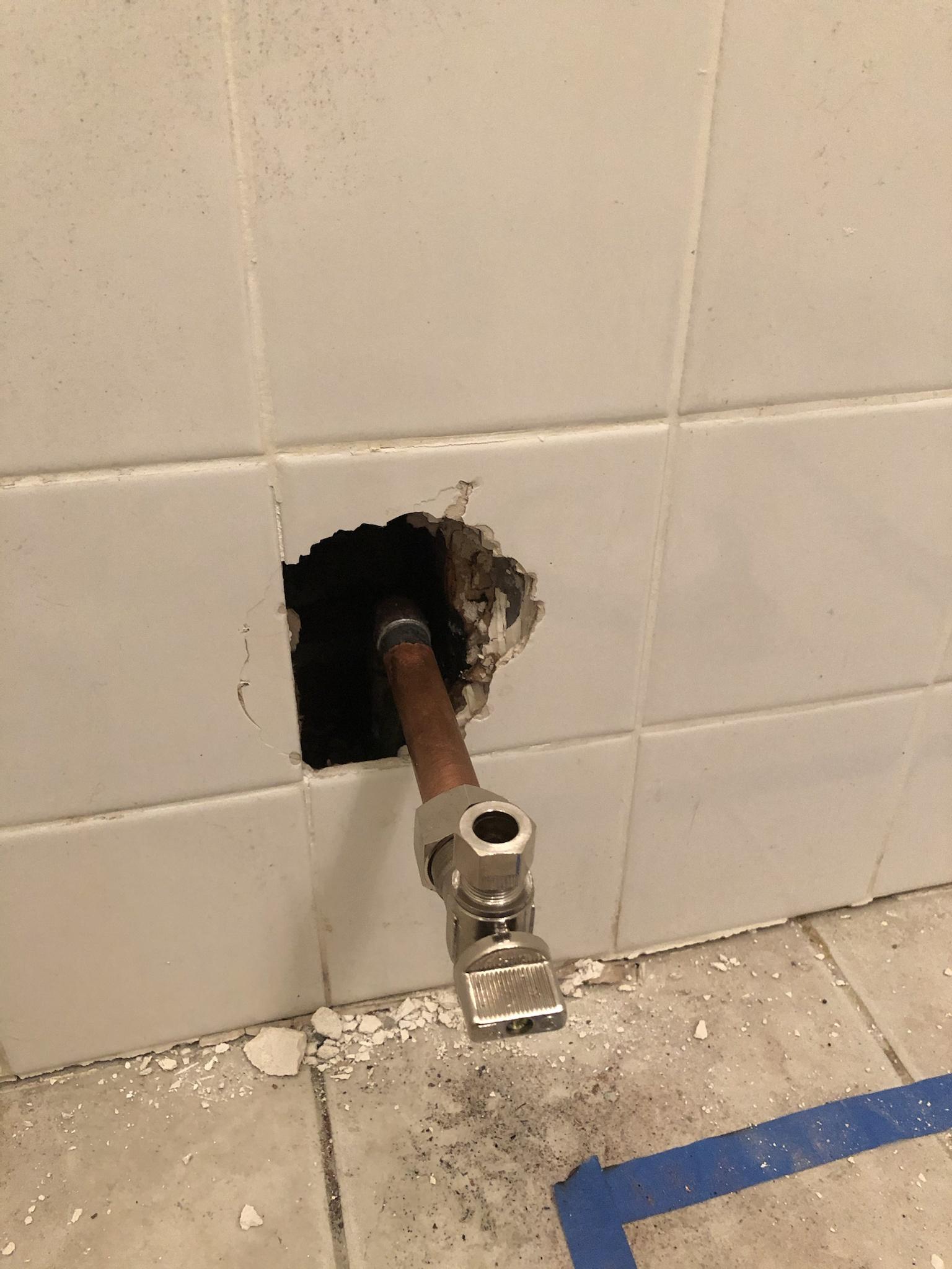 bathroom Single tile and drywall repair with a backing stud Home