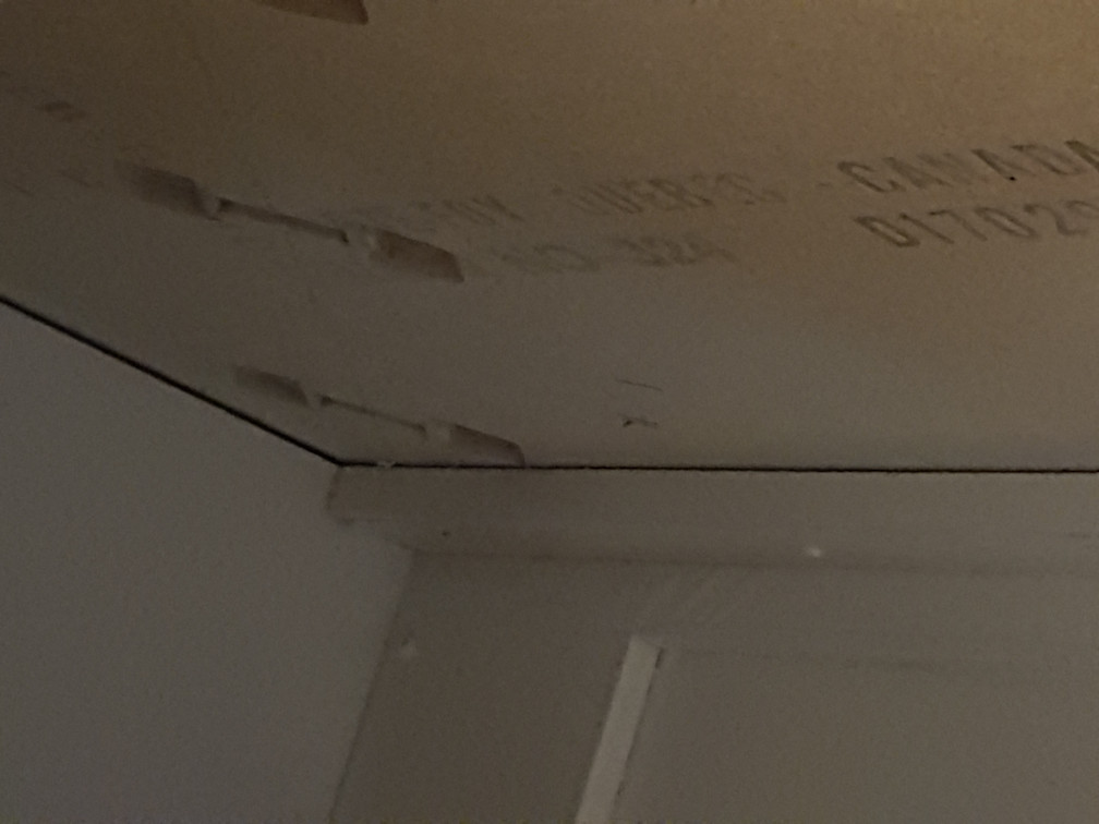 Secure dishwasher hoses under countertop with zip ties Love & Improve