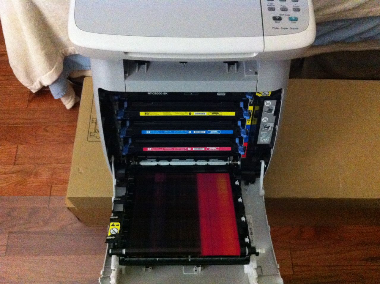 printing LaserJet prints half of all pages pink? Super User