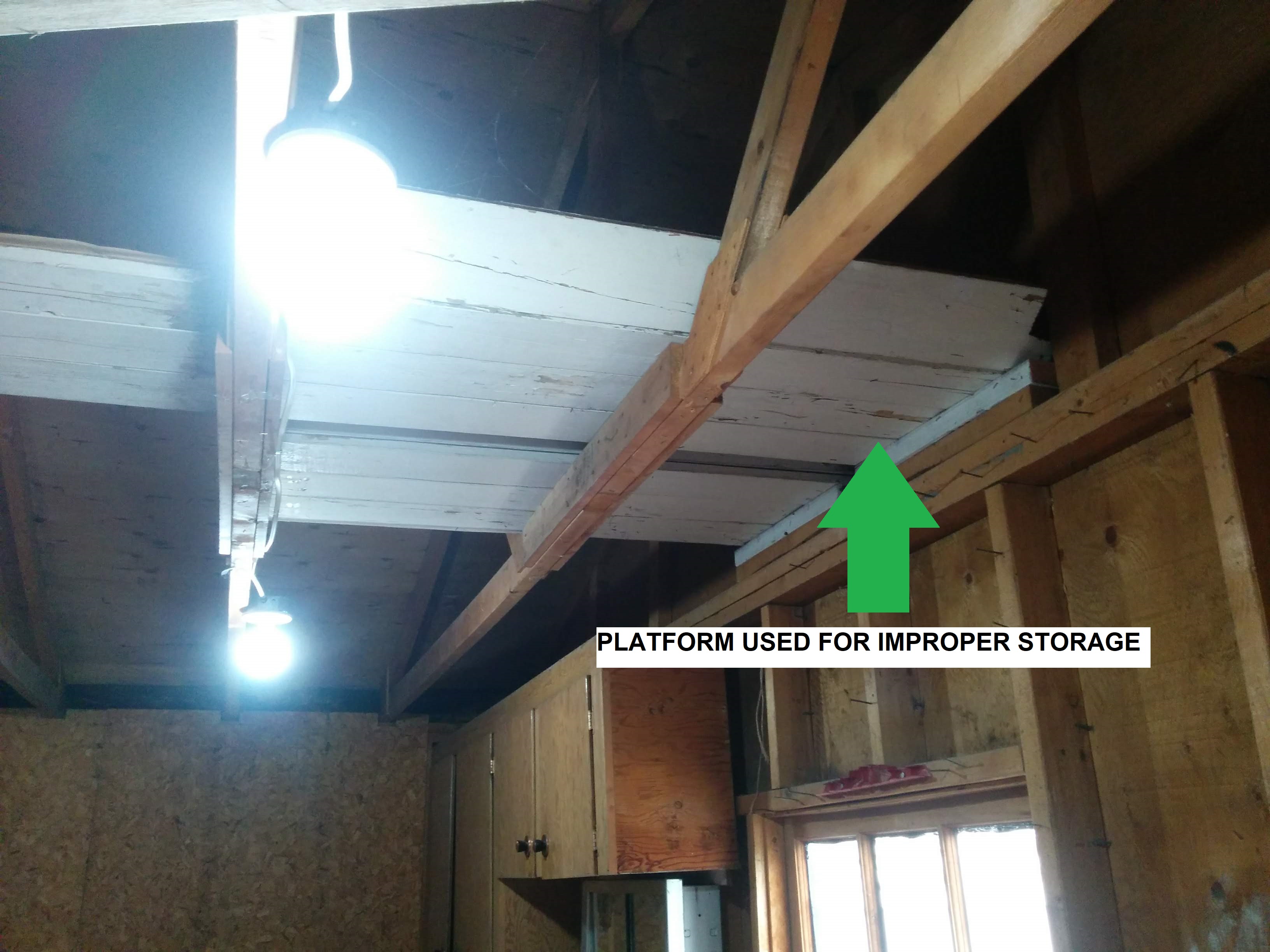 framing How can I safely reinforce my garage trusses to support