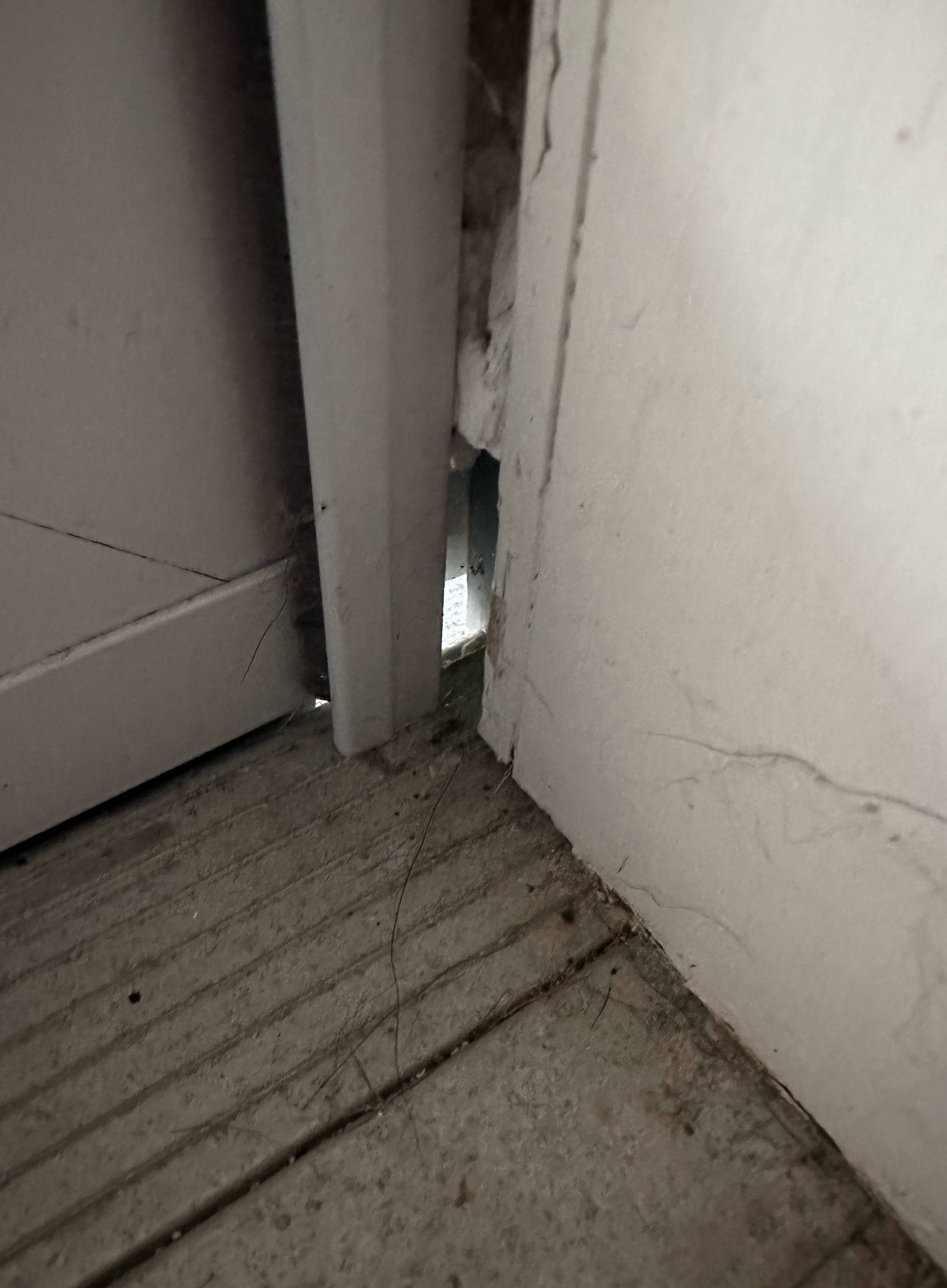 How can I fix corner of storm door frame with clear view of outside