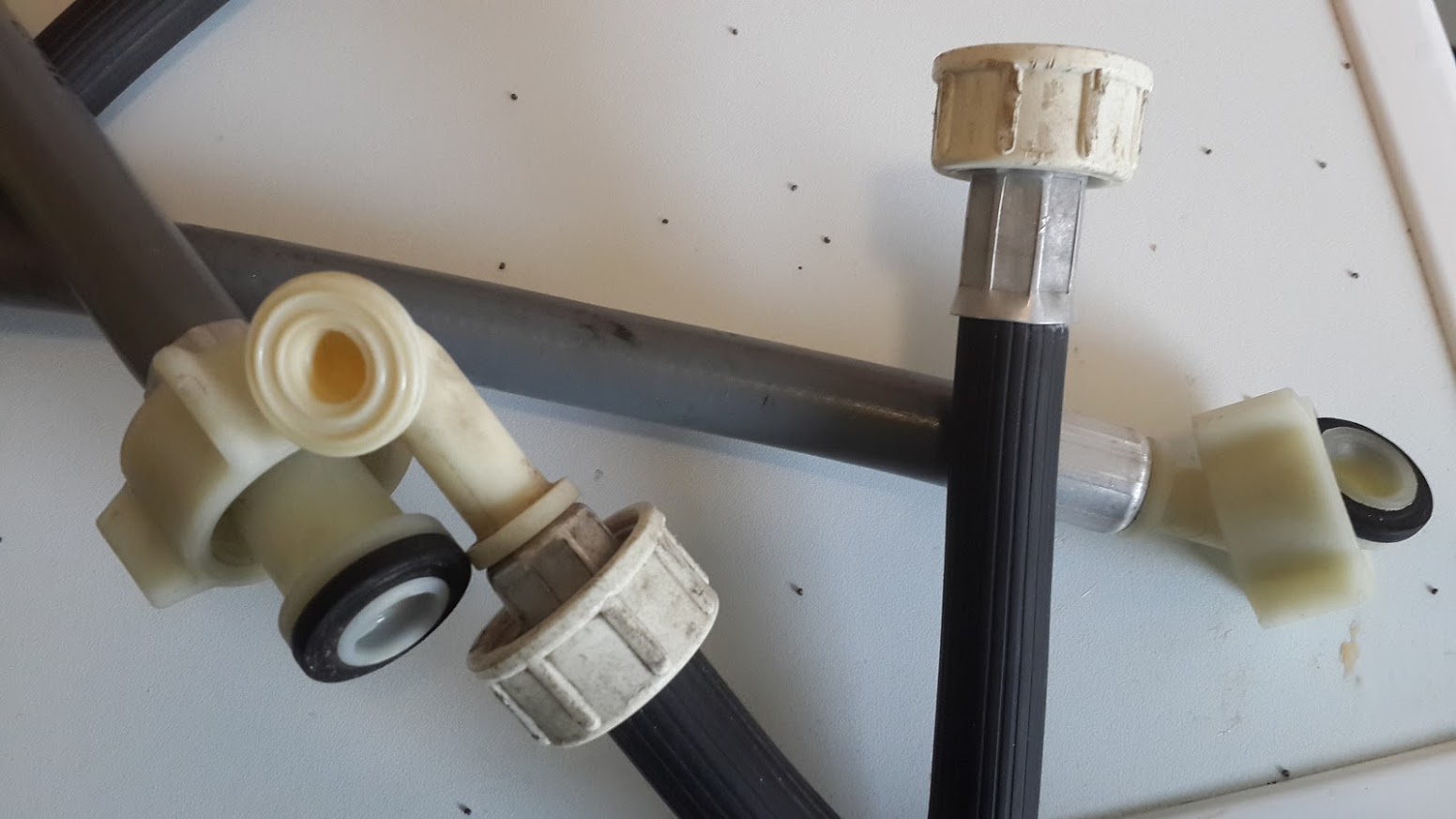 plumbing fixture How can I remove/reattach the clamp on a dishwasher