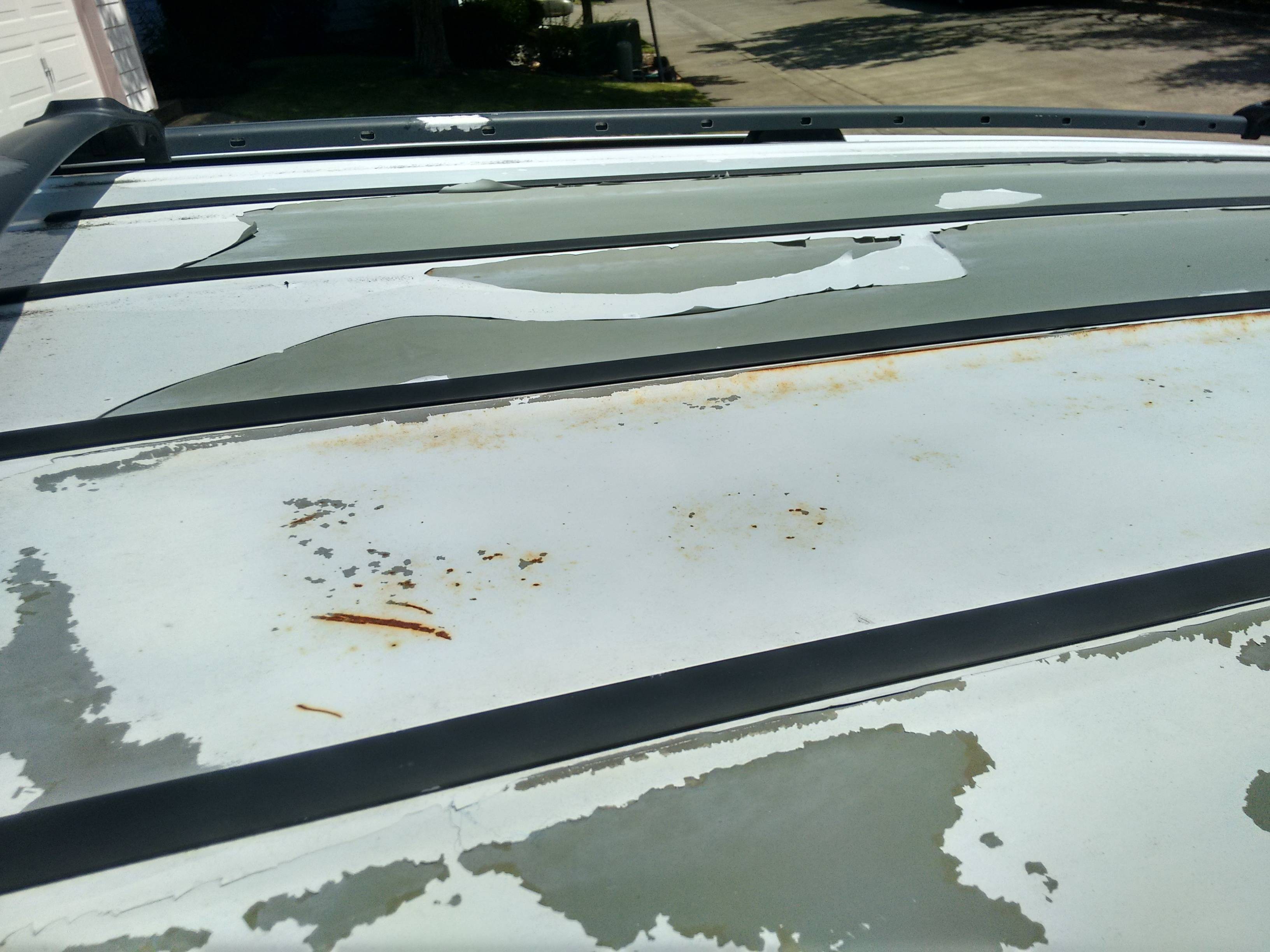dodge Roof paint peeling badly, with rust what to do? Motor Vehicle Maintenance & Repair