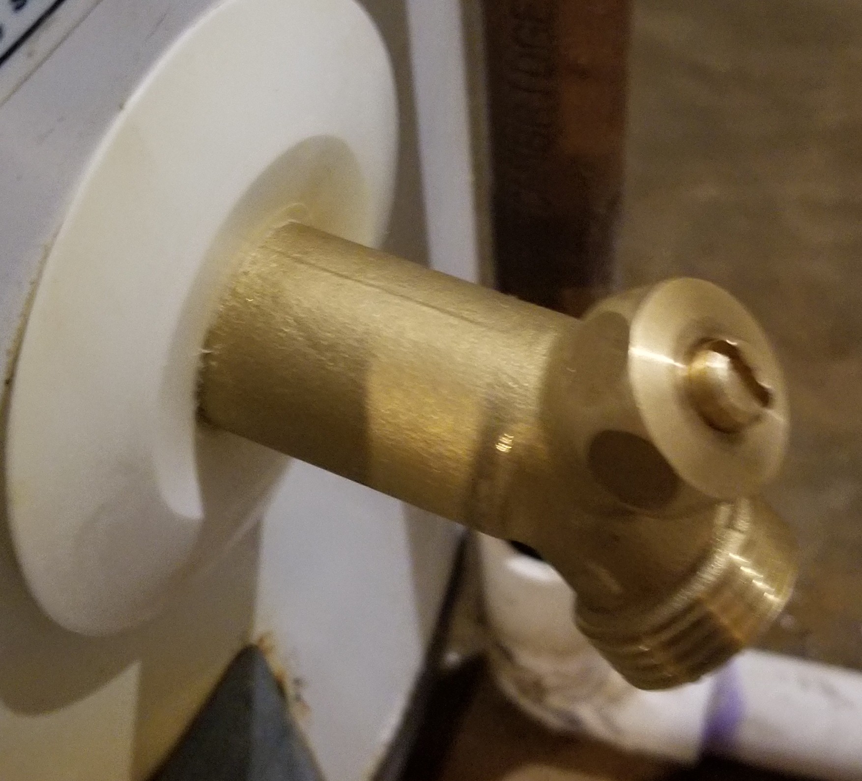 Hot Water Heater leaks through drainage spigot after flushing Home