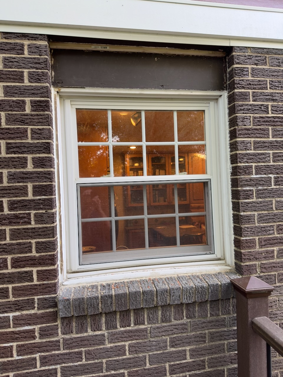 How do I seal and make this window in brick casement look better
