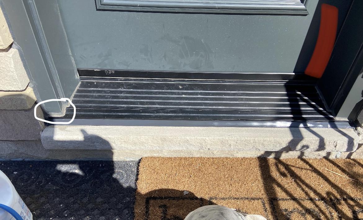 caulking Should this exterior door threshold be caulked here? Home