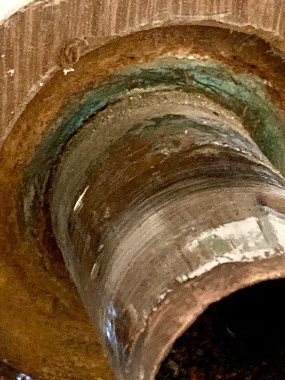 plumbing 11/4 brass sink drain pipe stuck in larger cast iron elbow