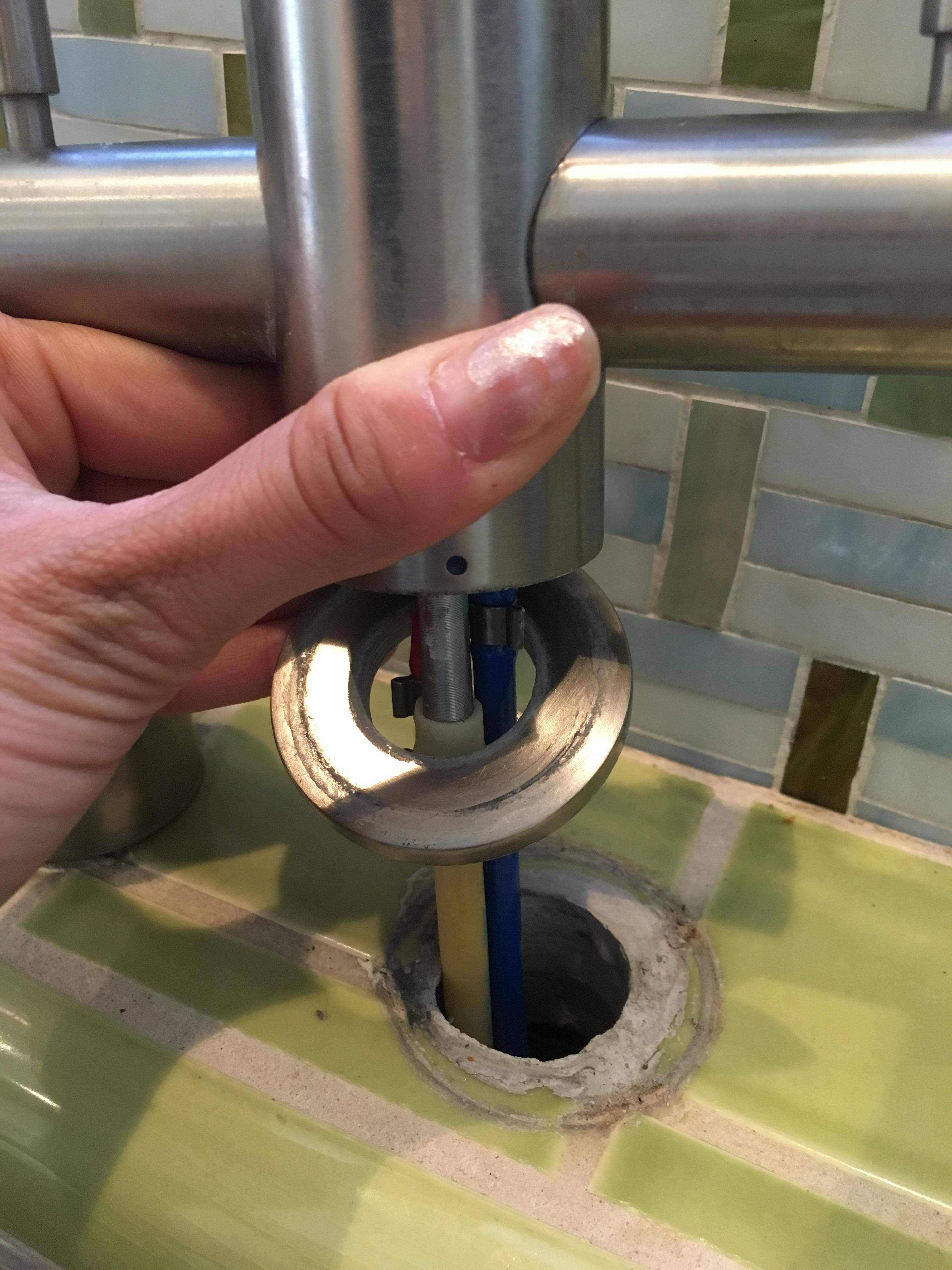 repair My water filter faucet came unattached from base & sink. How