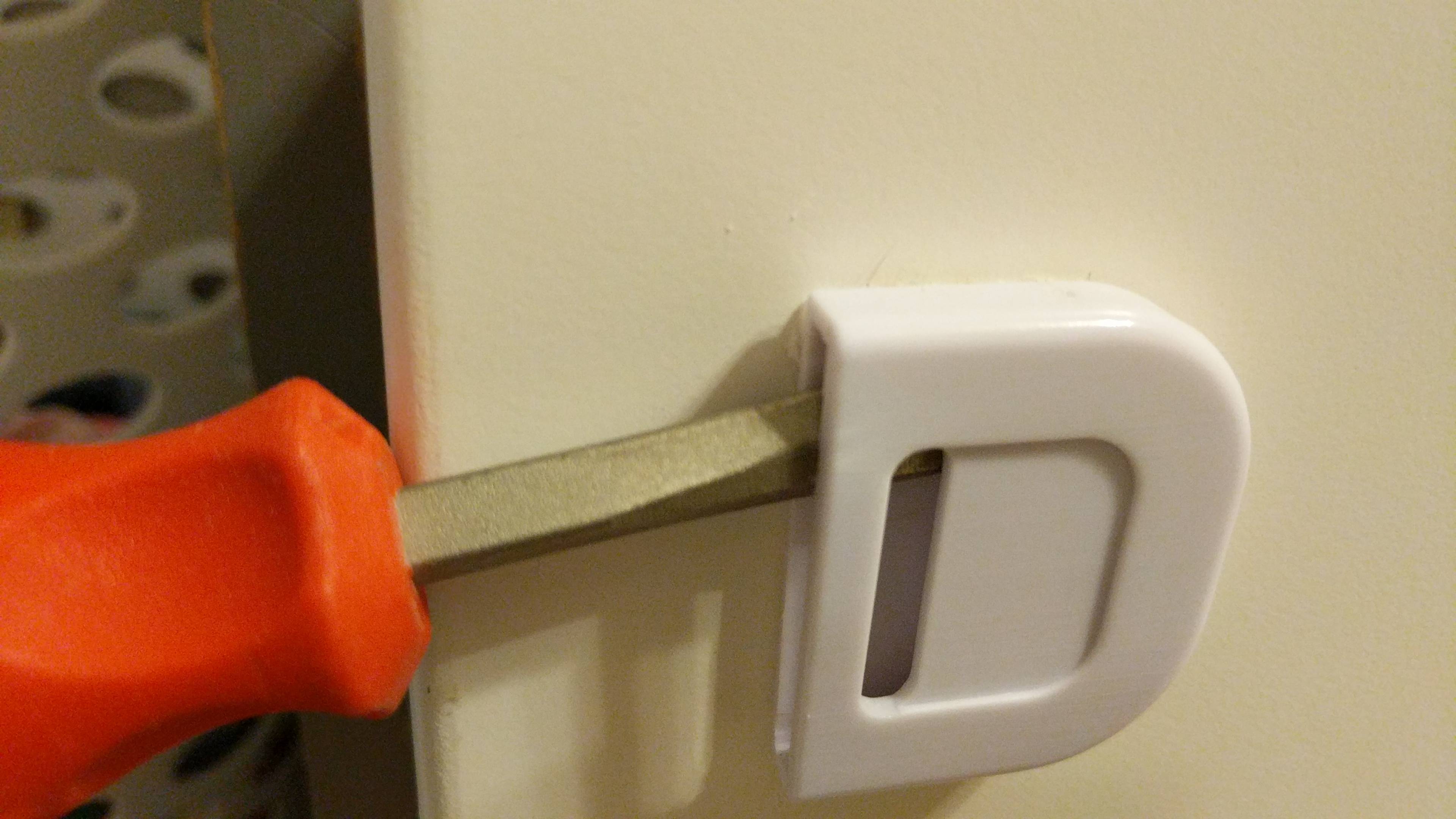 [SOLVED] How do you remove the stickon child safety locks from