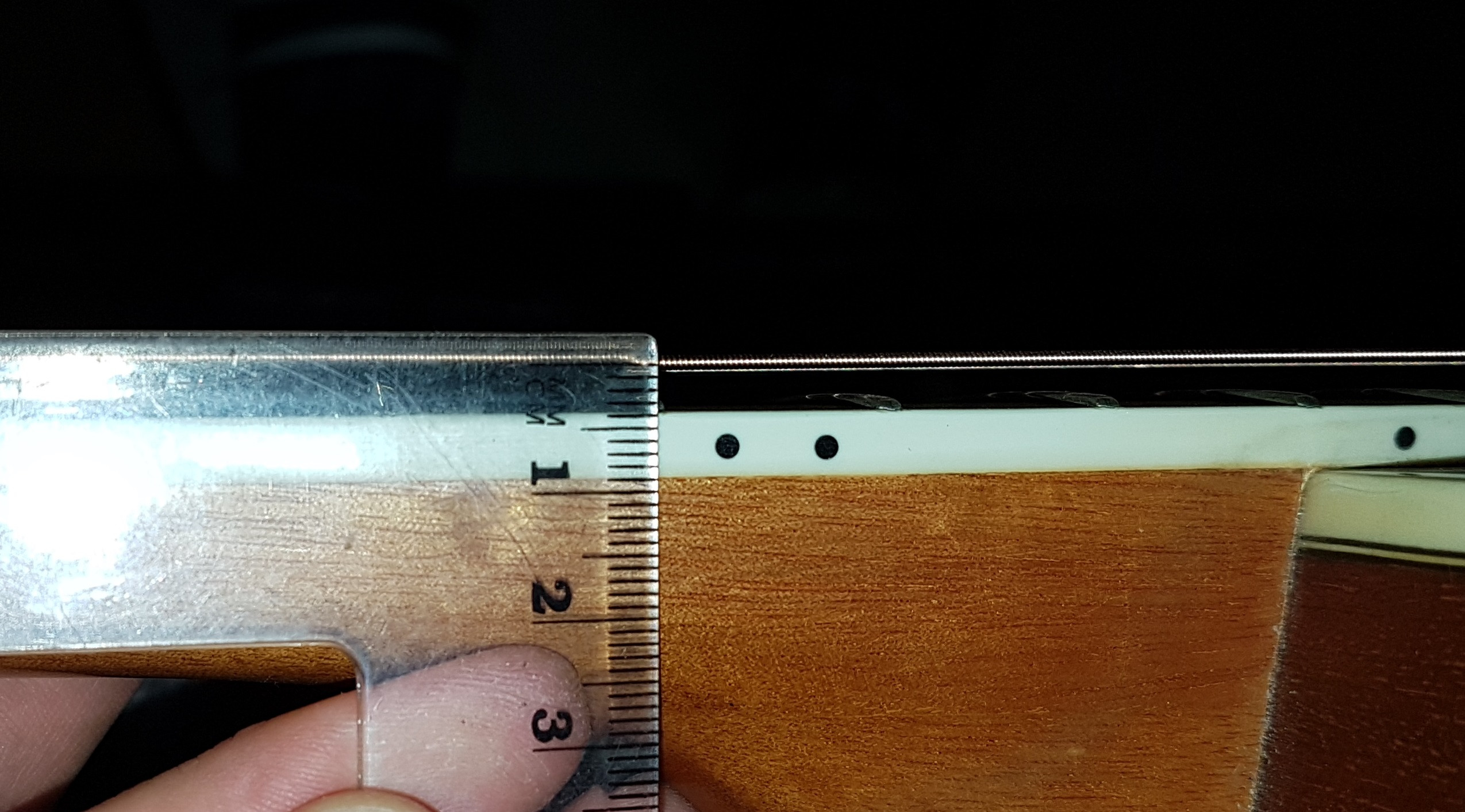 maintenance When adjusting the neck of an acoustic guitar, what