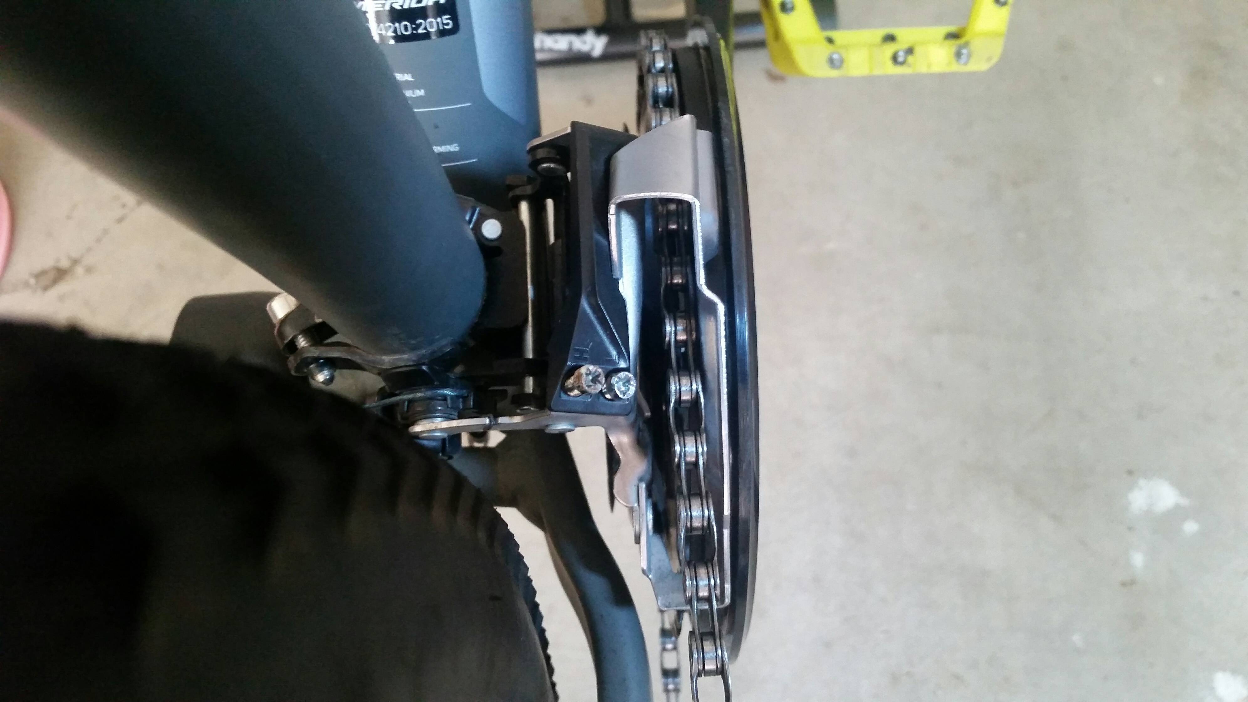 [SOLVED] Chain hitting front derailleur cage with H limit screw fully