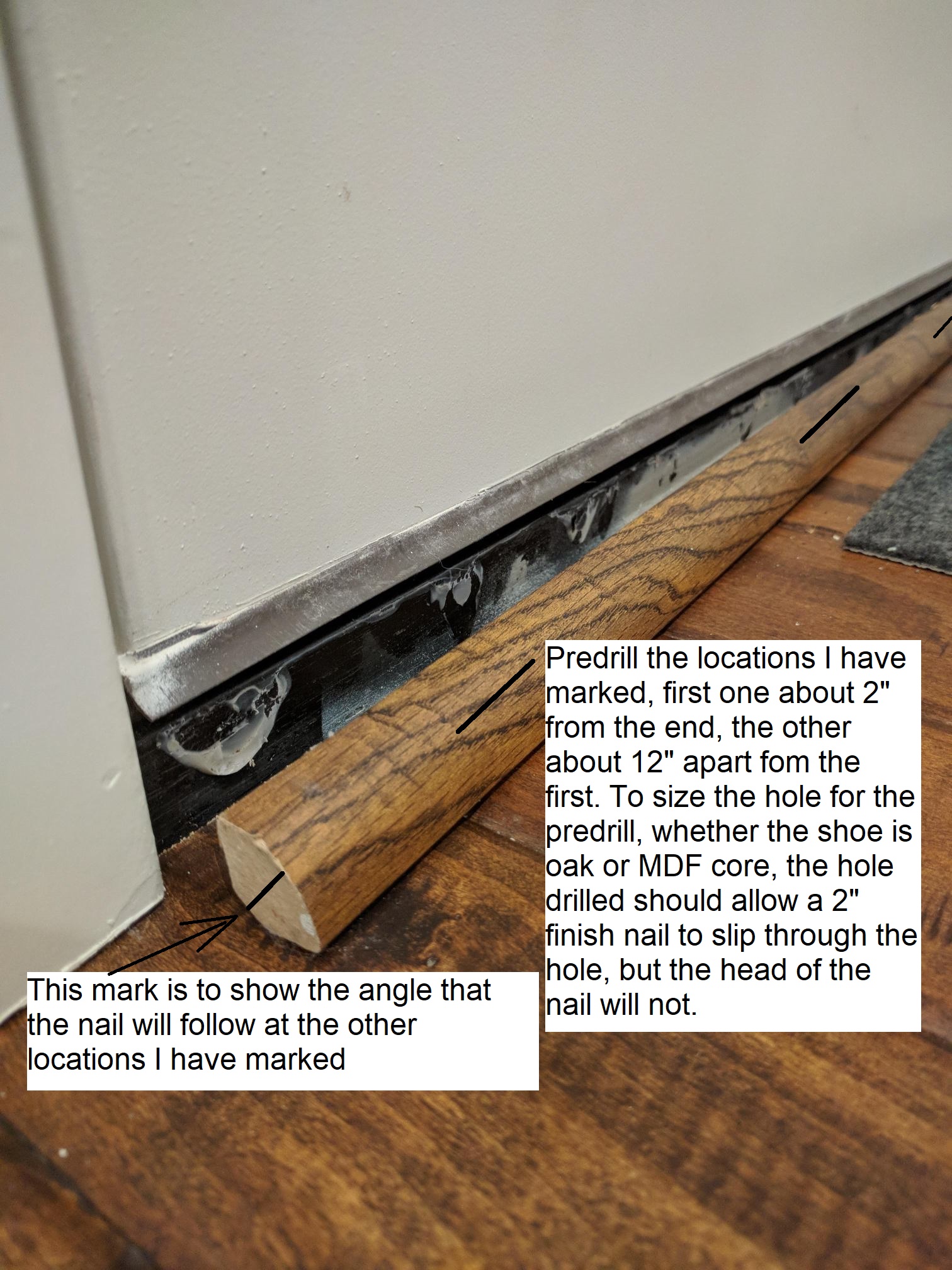 repair Reattach quarterround molding under front door Home