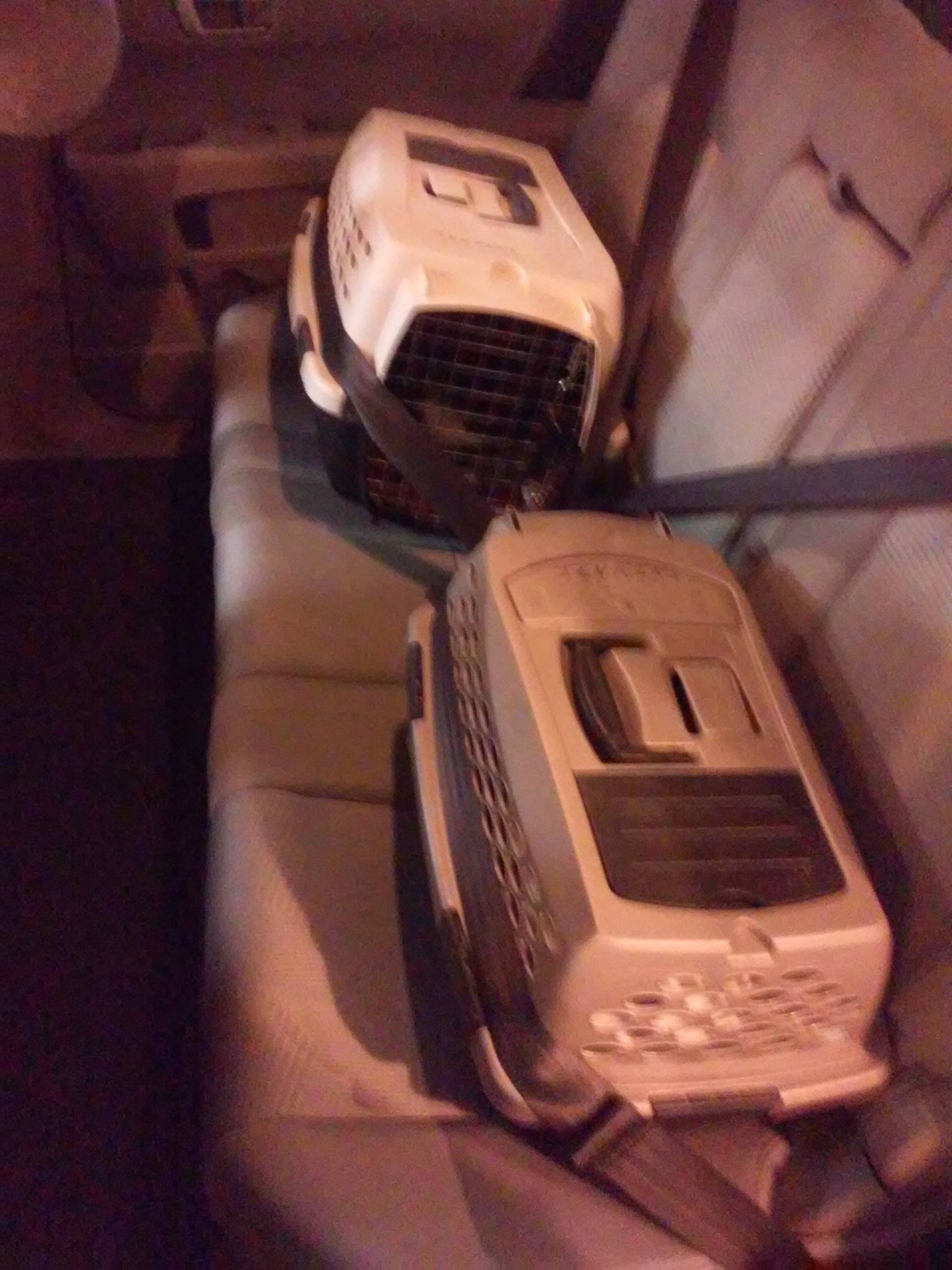 safety What is the safest position for a pet carrier in a car? Pets