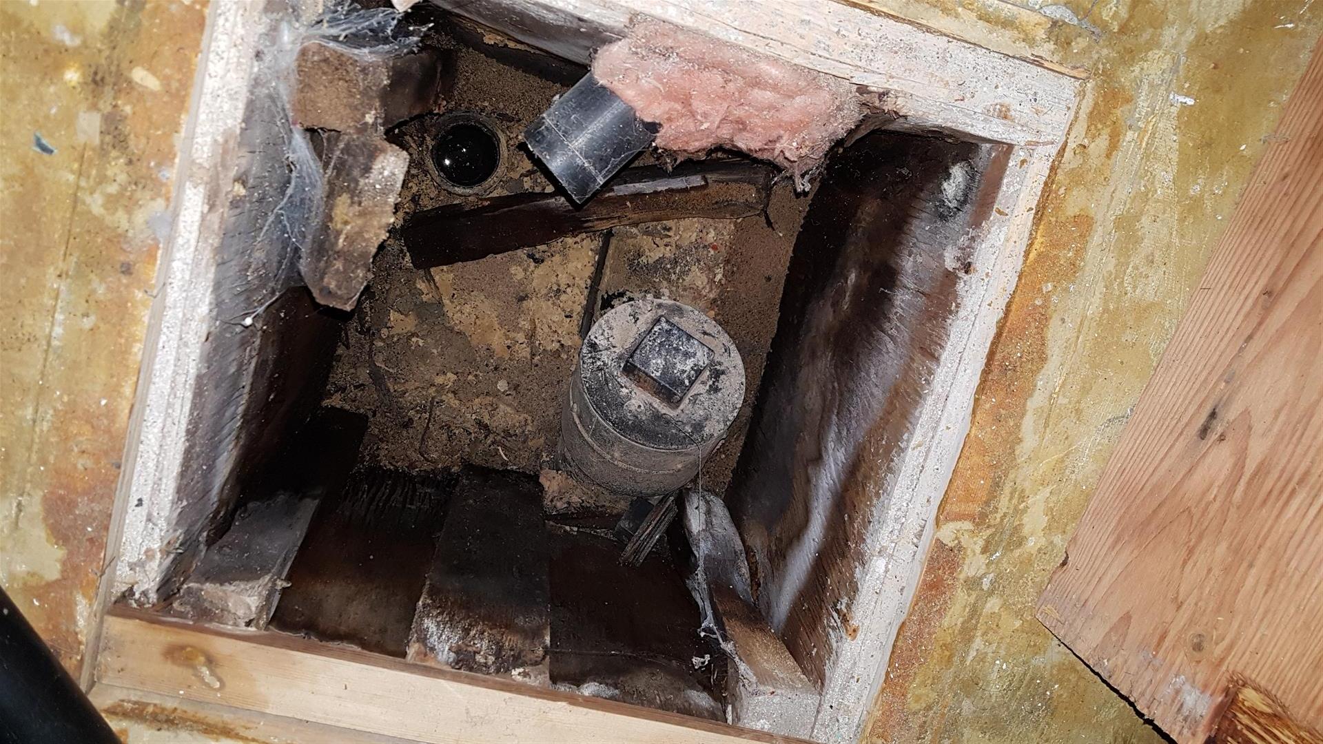 What is this open pipe below the basement floor? Home
