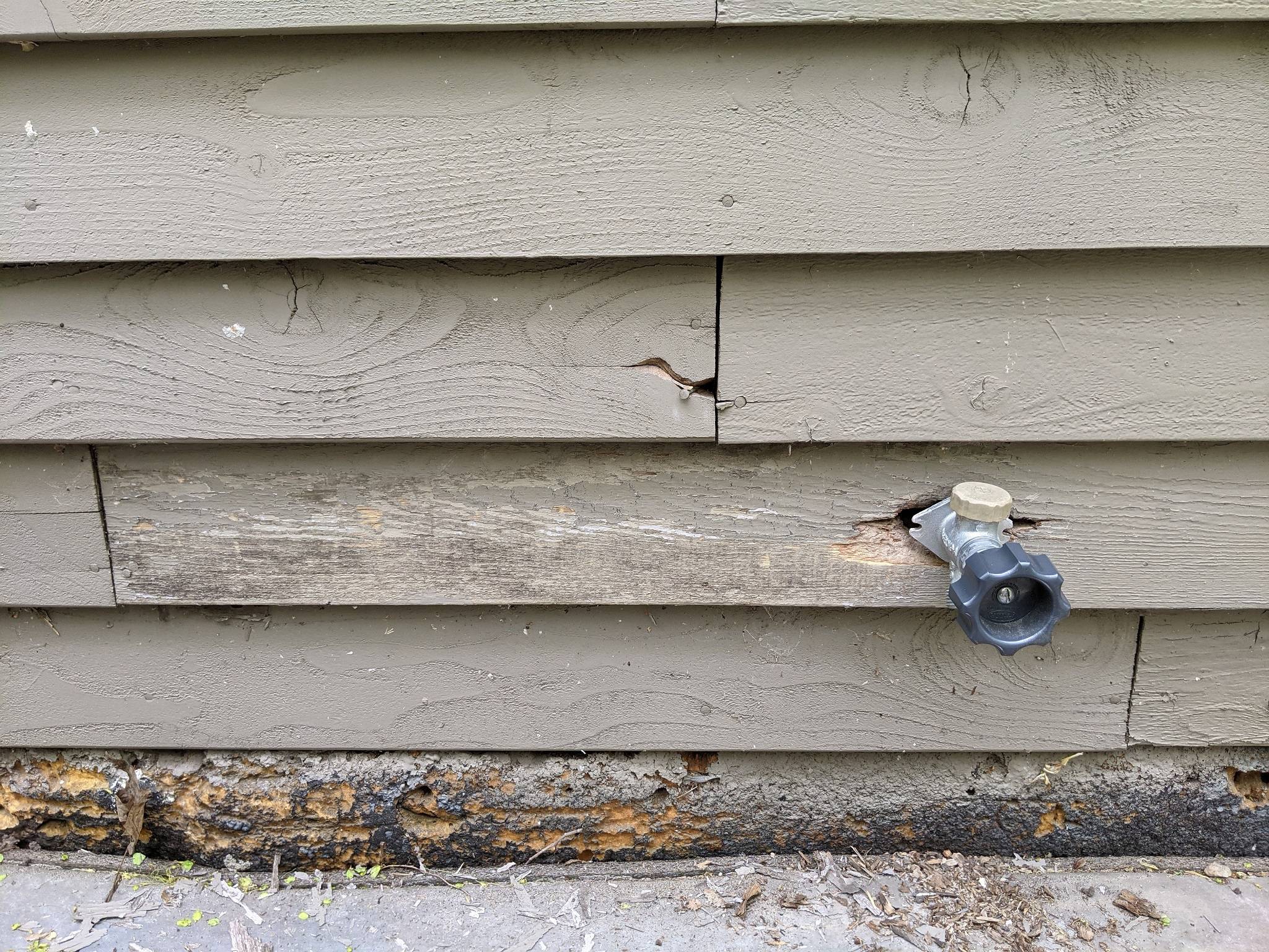 How can I repair rotten siding around my hose spigot? Home