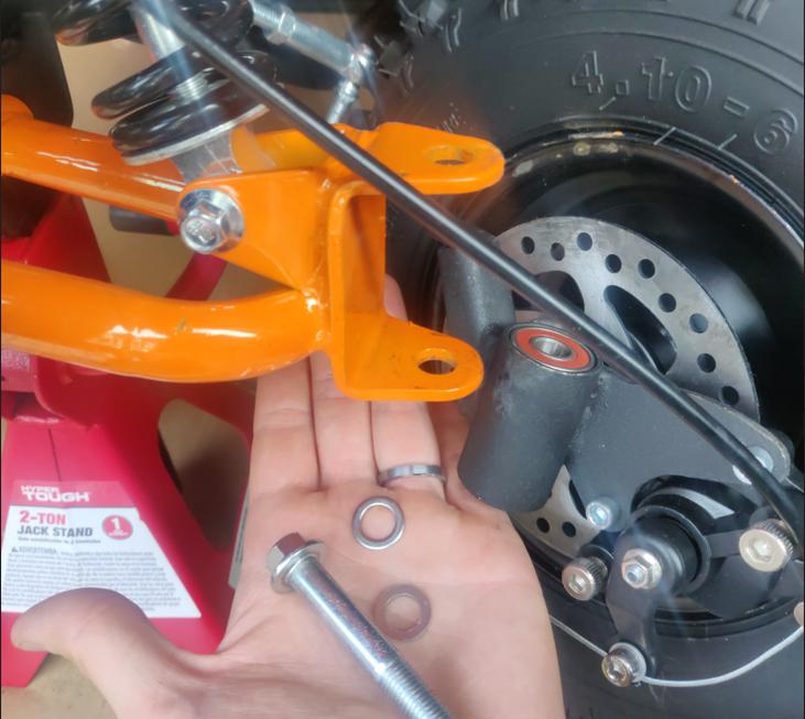 atv How should steering knuckle be attached to suspension arm