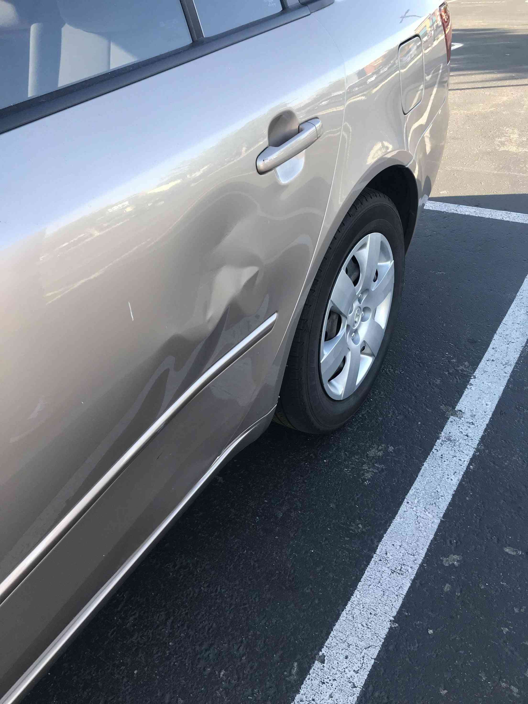 car Dent in rear passenger door Motor Vehicle Maintenance & Repair