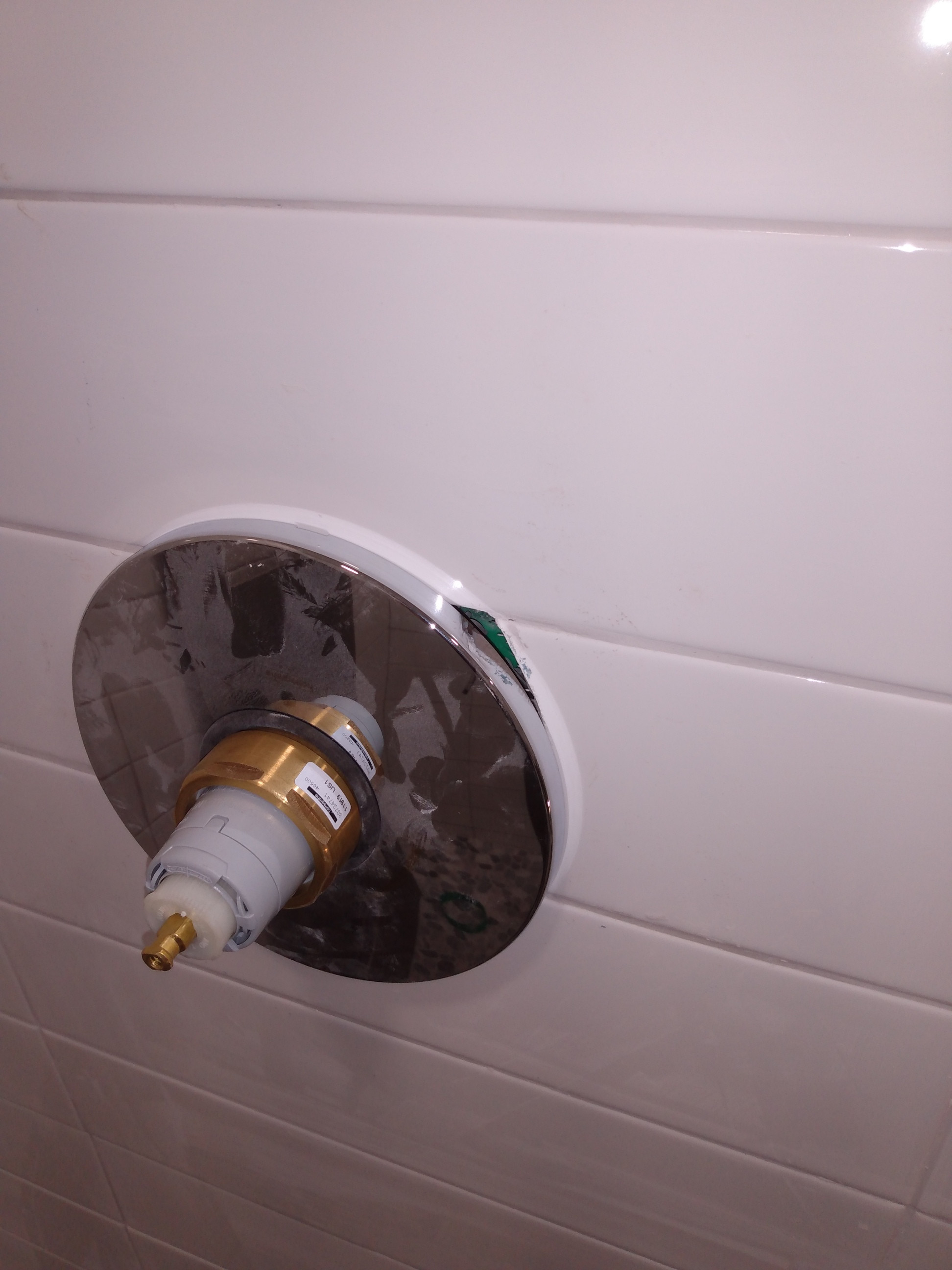 How do I extend shower cover plate without replacing a tile Home
