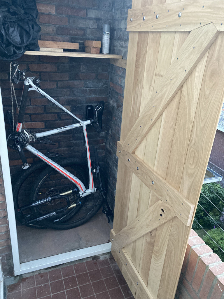 wood Selfbuilt shed door warping can it be fixed? Home
