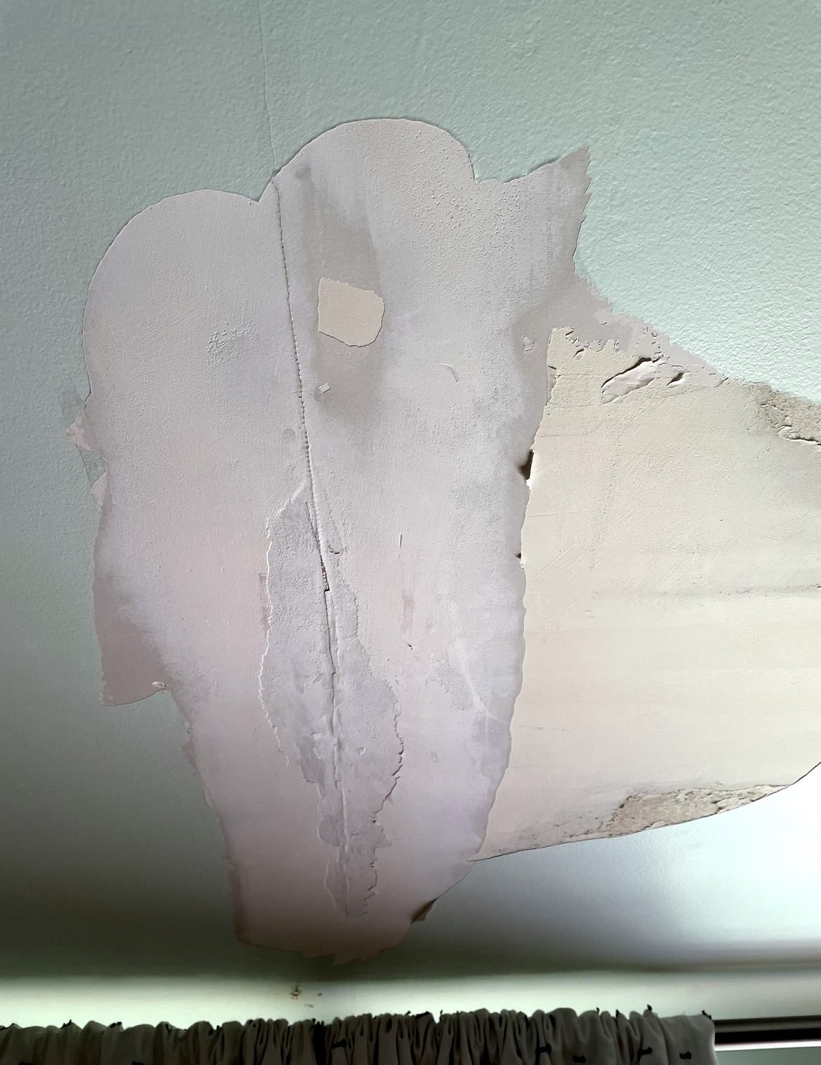 Is Exposed Drywall After a Ceiling Leak an Asbestos Concern? Home