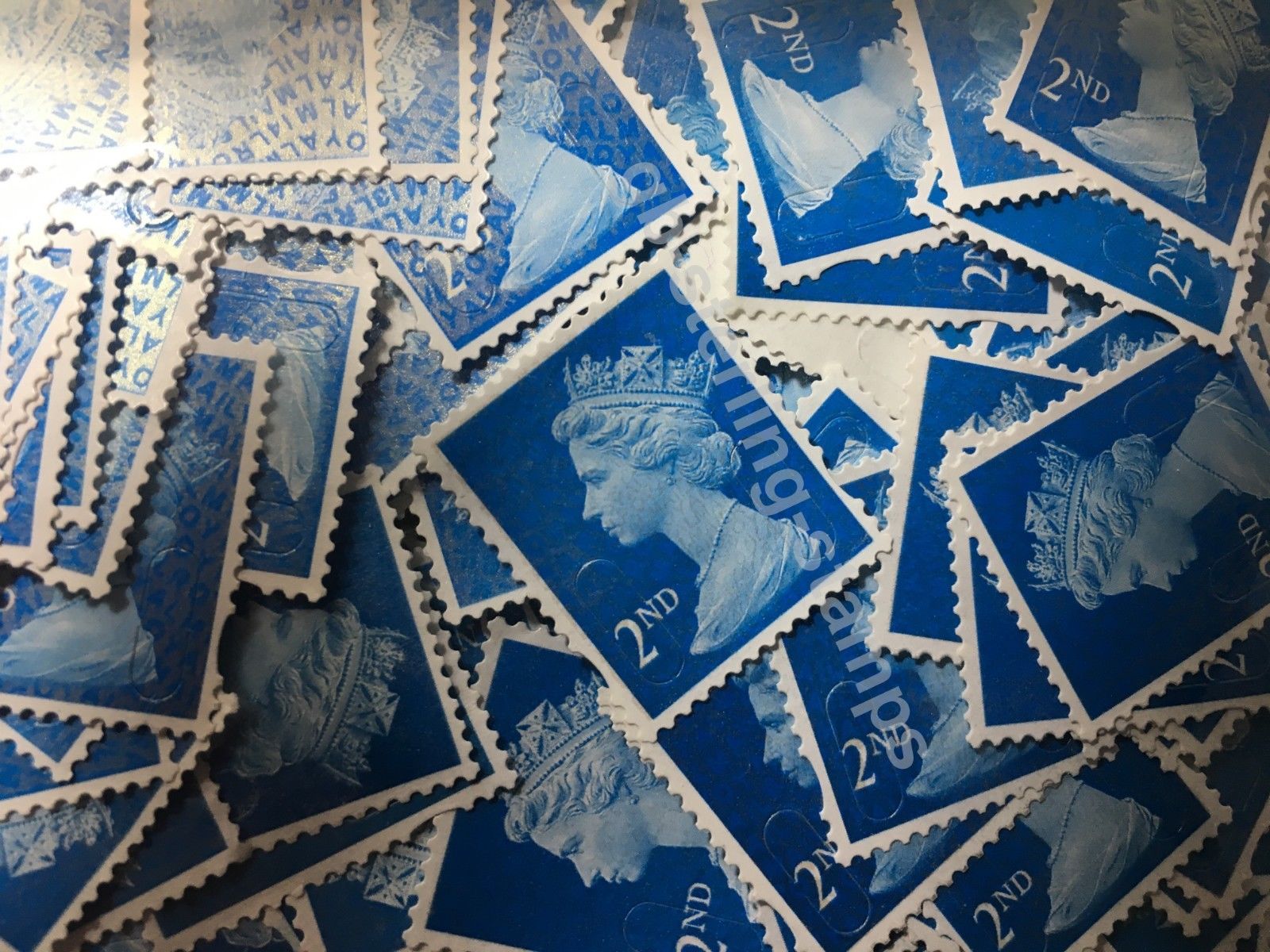 meaning Used Postal Stamps and a Process of Stamping Them English