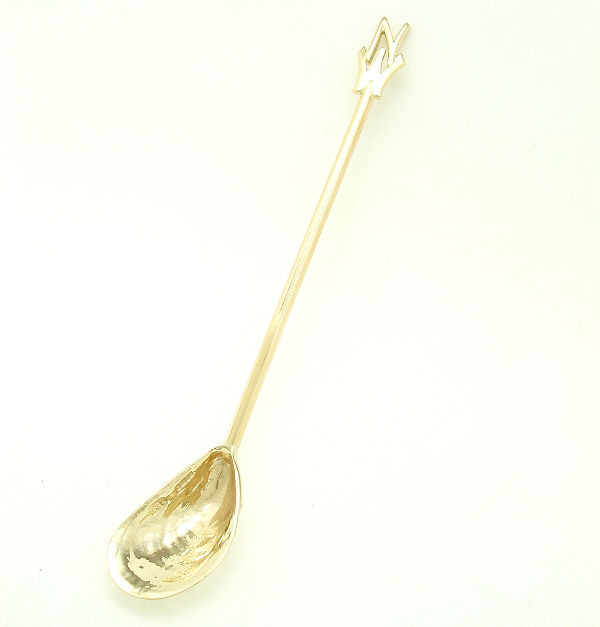 word choice 'Golden spoon' or 'Gold spoon' if the spoon is made of