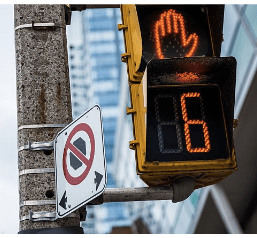 What does this traffic sign with a crossedout black octagon mean? Q