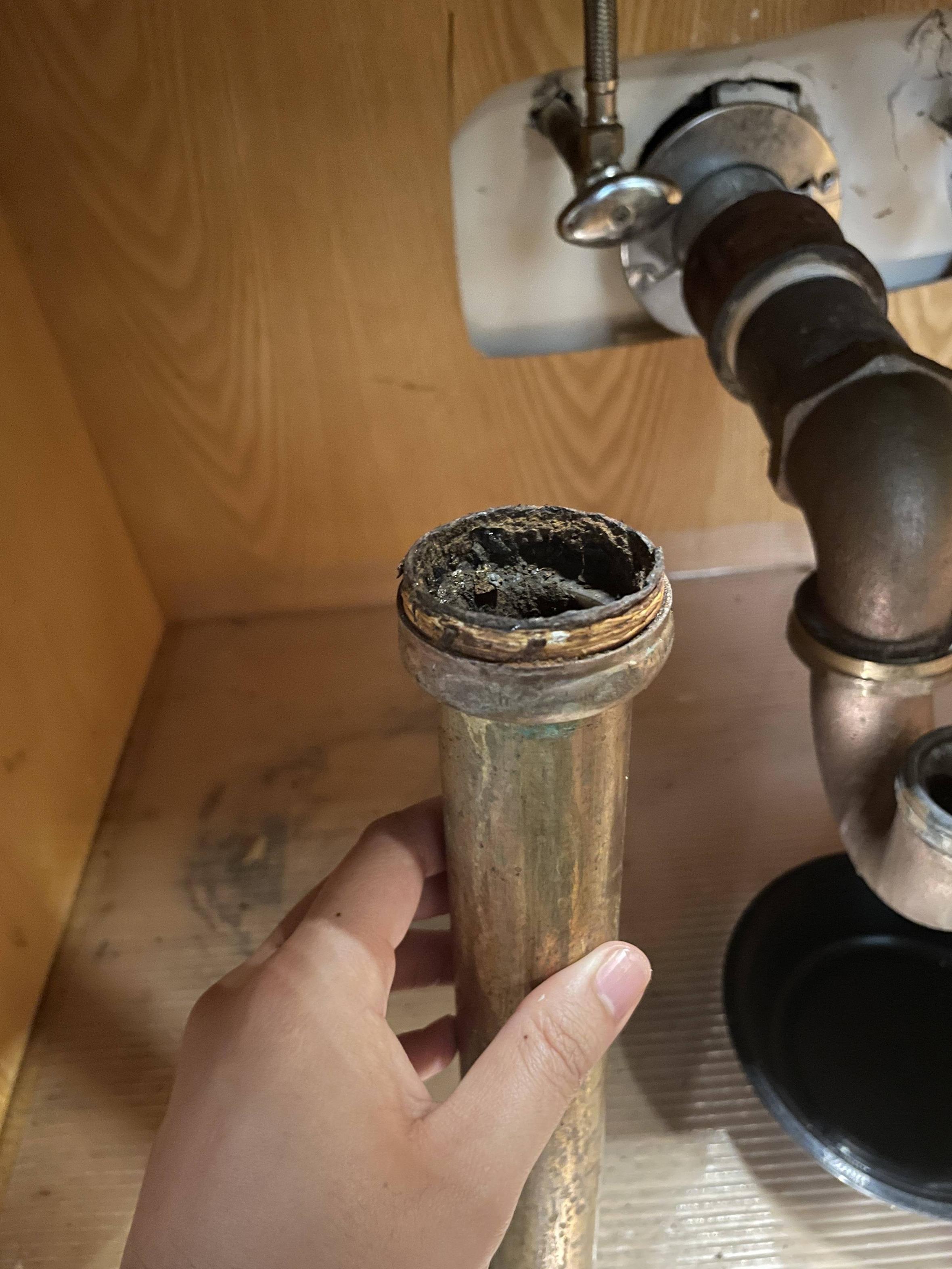 Rusted kitchen basket strainer, mystery plumbing under the sink Home