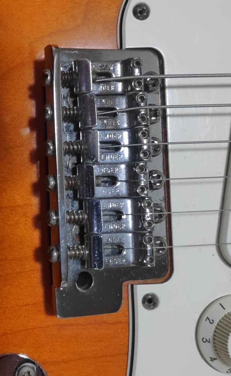 Electric guitar bridge lifted too much, intonation problems Music