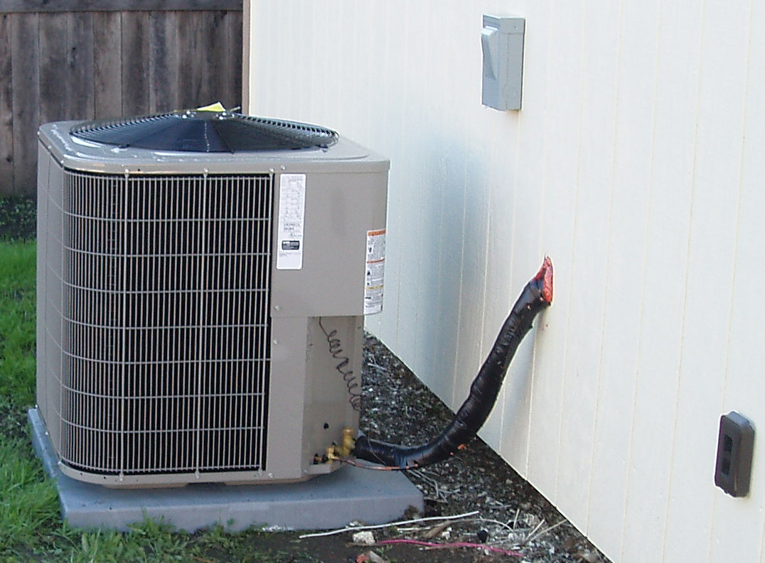 The correct way to seal/flash coolant lines through T111 siding Love