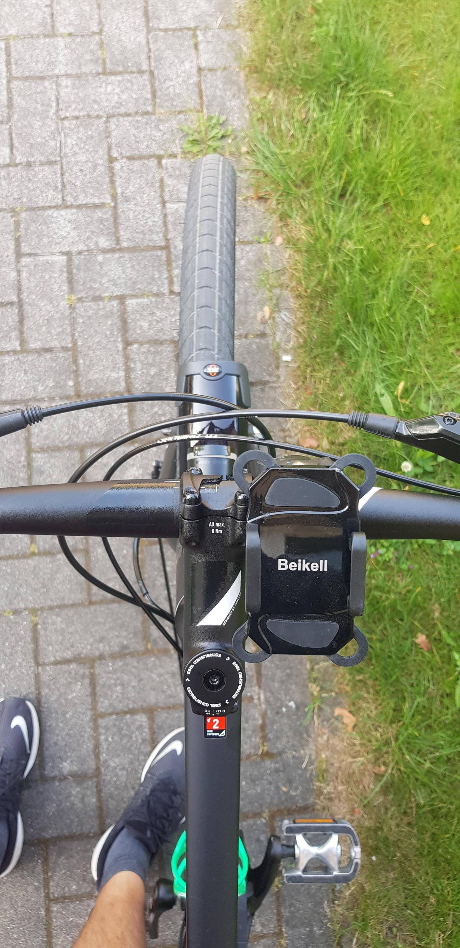 Front wheel is not aligned and touching the brake line Bicycles