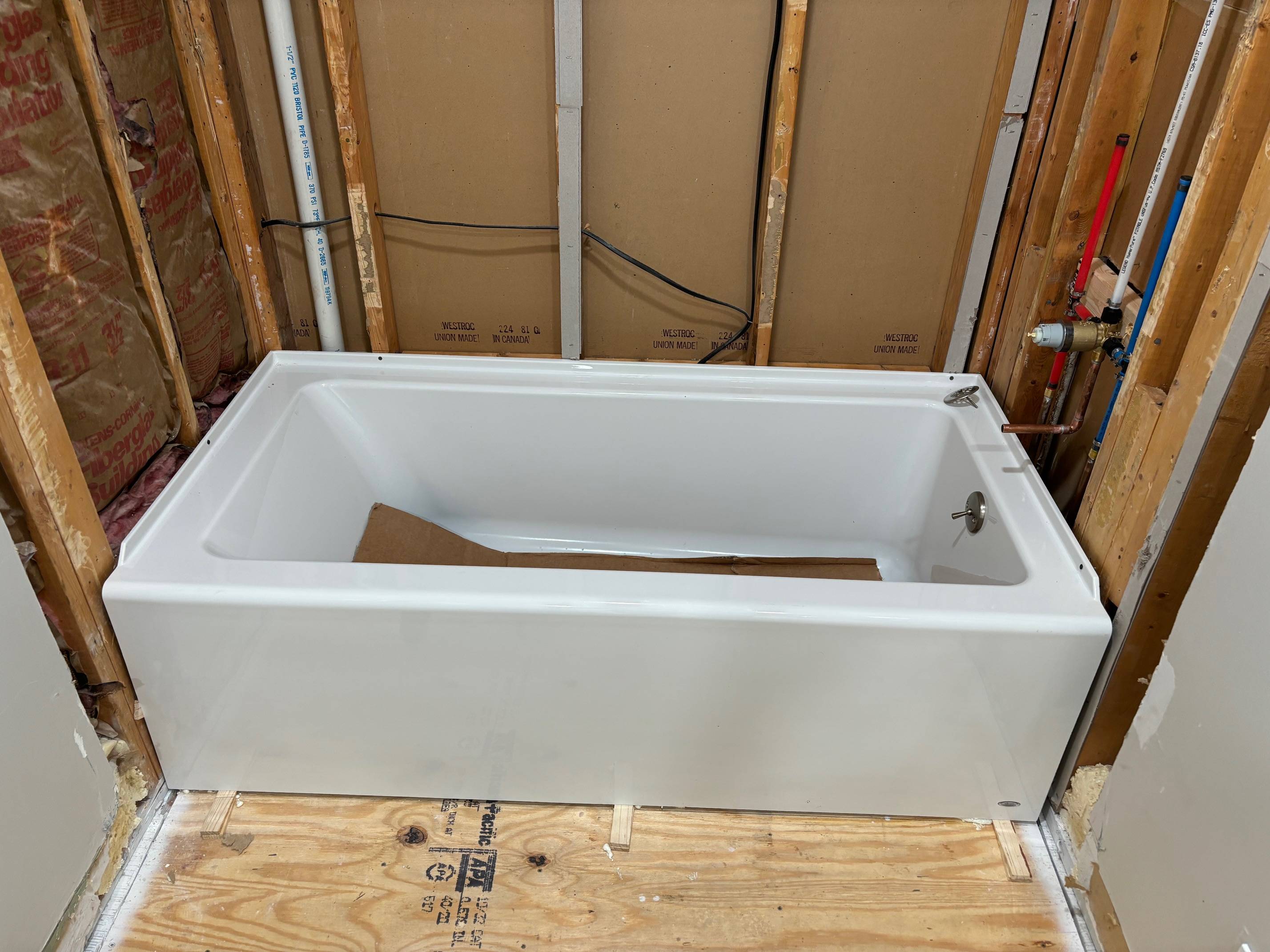 bathtub What to do about the gap between the tub and the studs? Home Improvement Stack Exchange