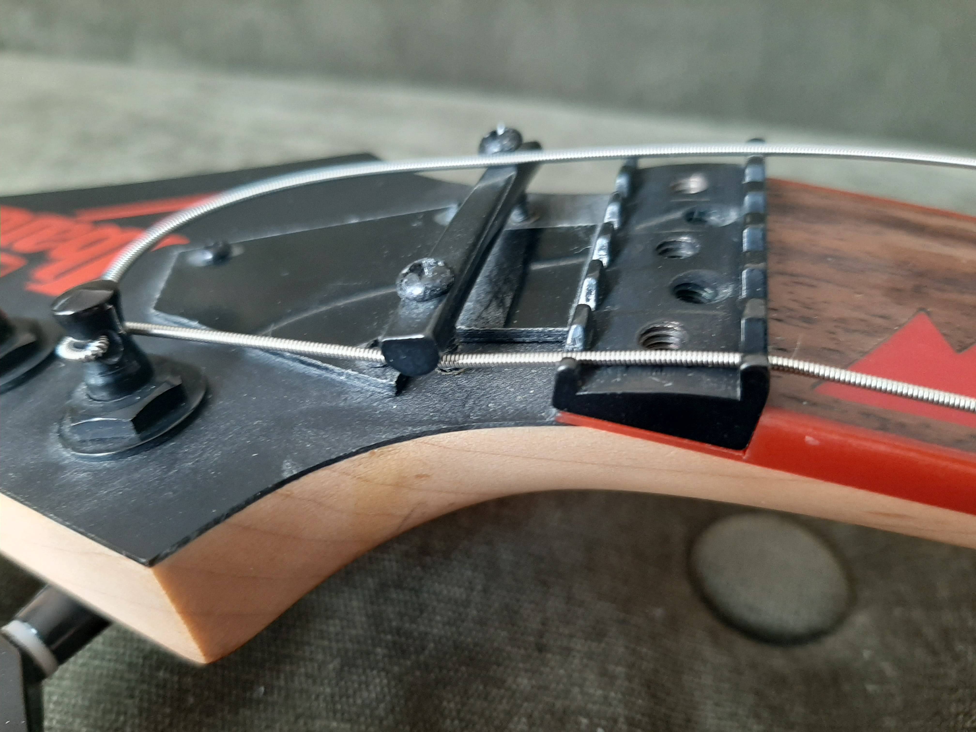 tuning Install new strings on guitar with whammy bar Music