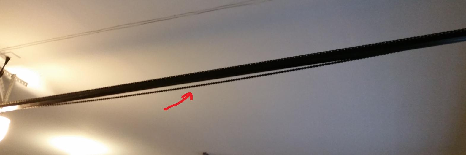 Ok for garage door chain to sag on one side when door is closed? Home