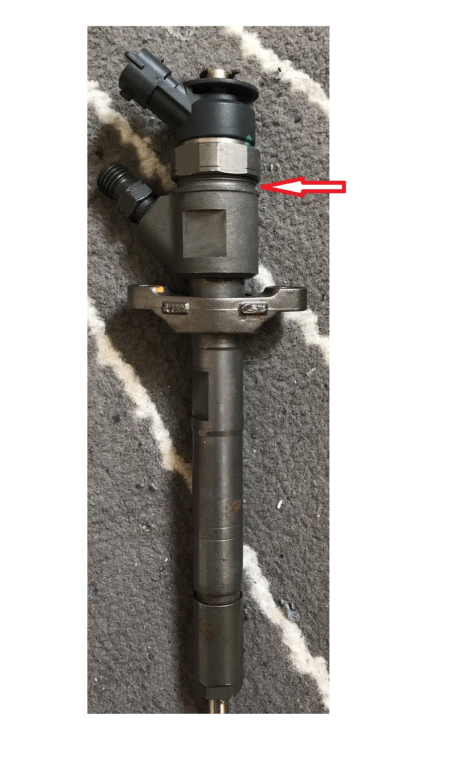 engine Injector leaking/seeping clean diesel over nut/body Motor