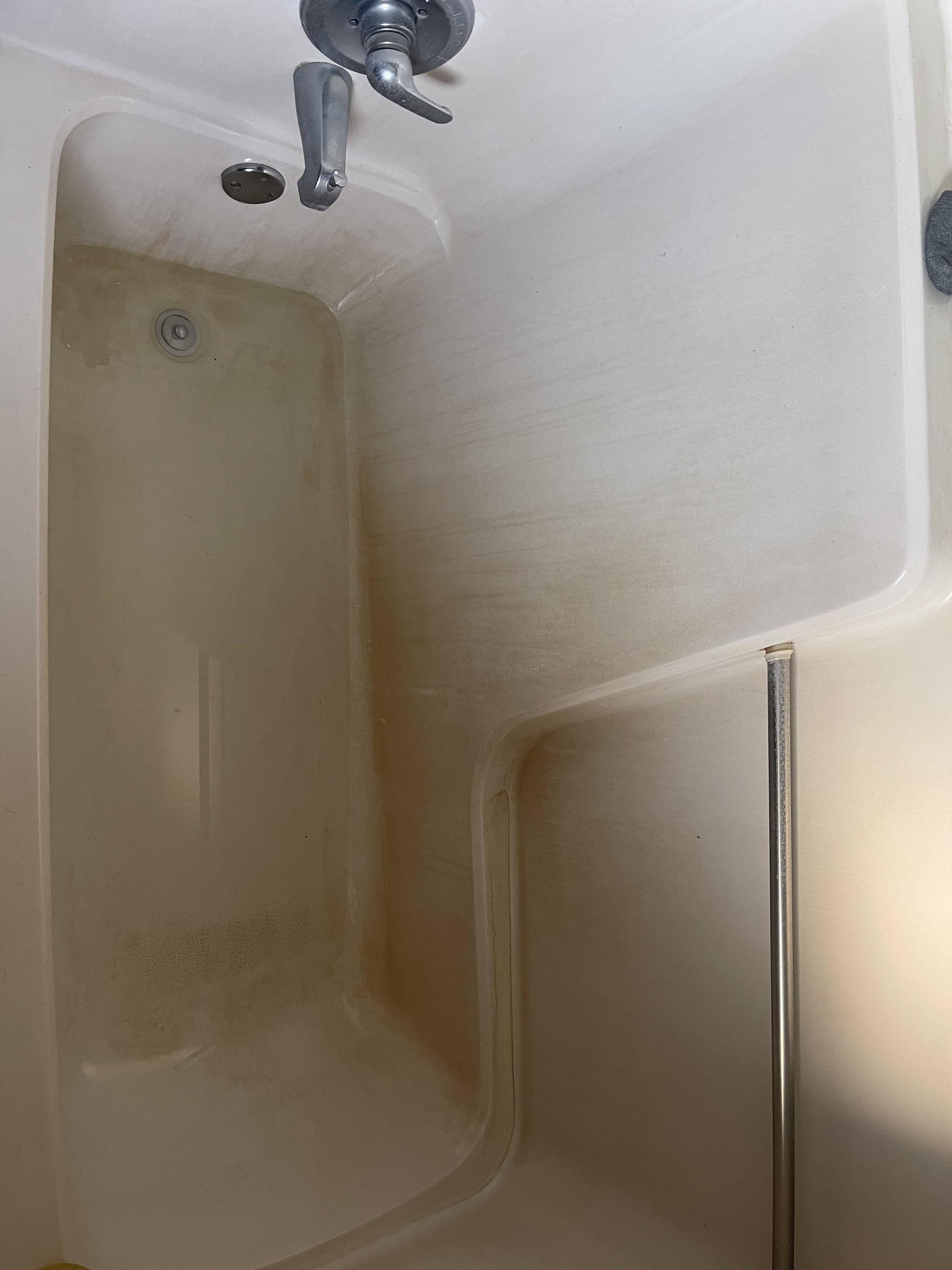 bathroom How can I get rid of the discoloration on this tub? Home