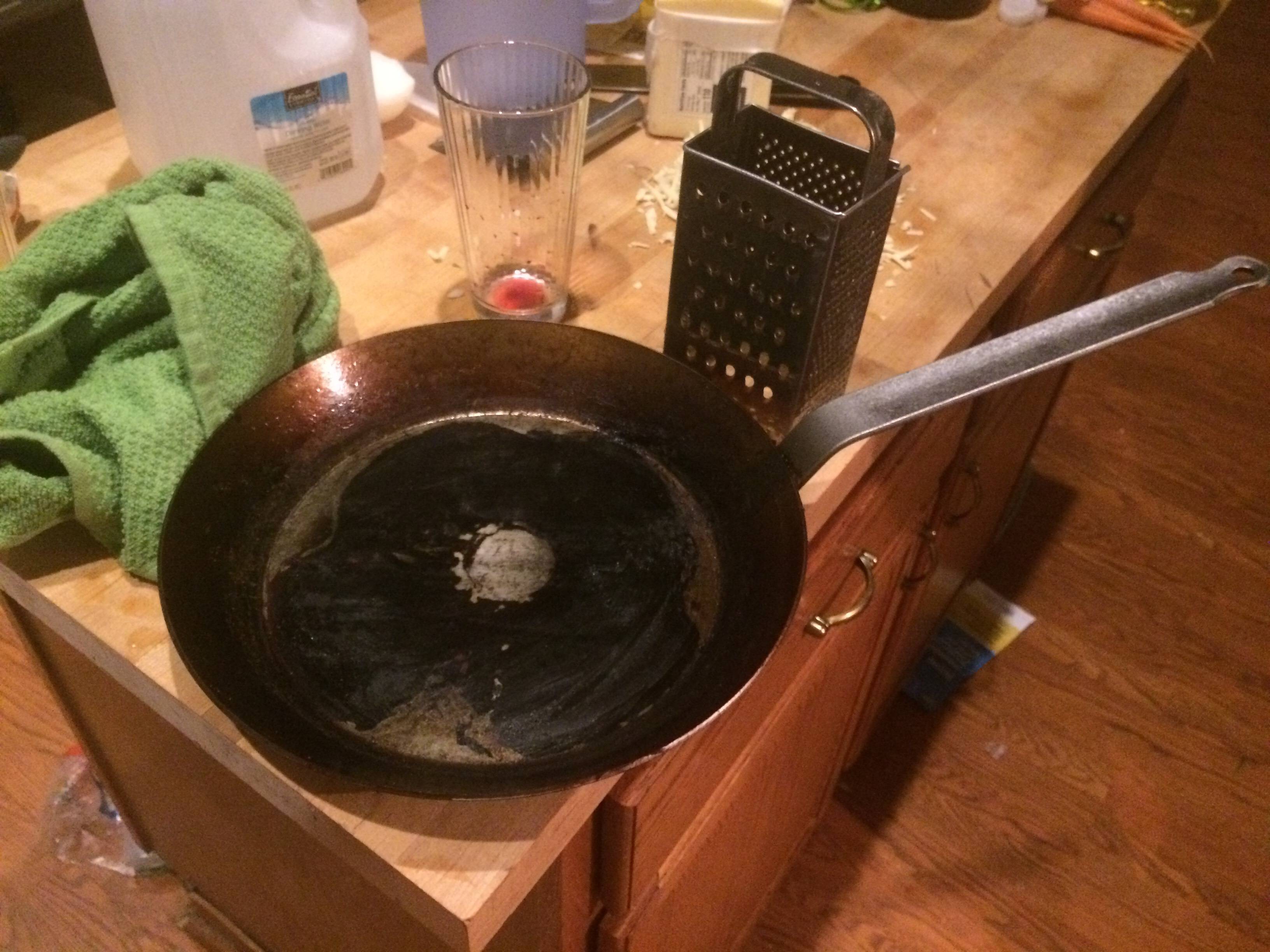 Carbonized oil when seasoning carbon steel Seasoned Advice