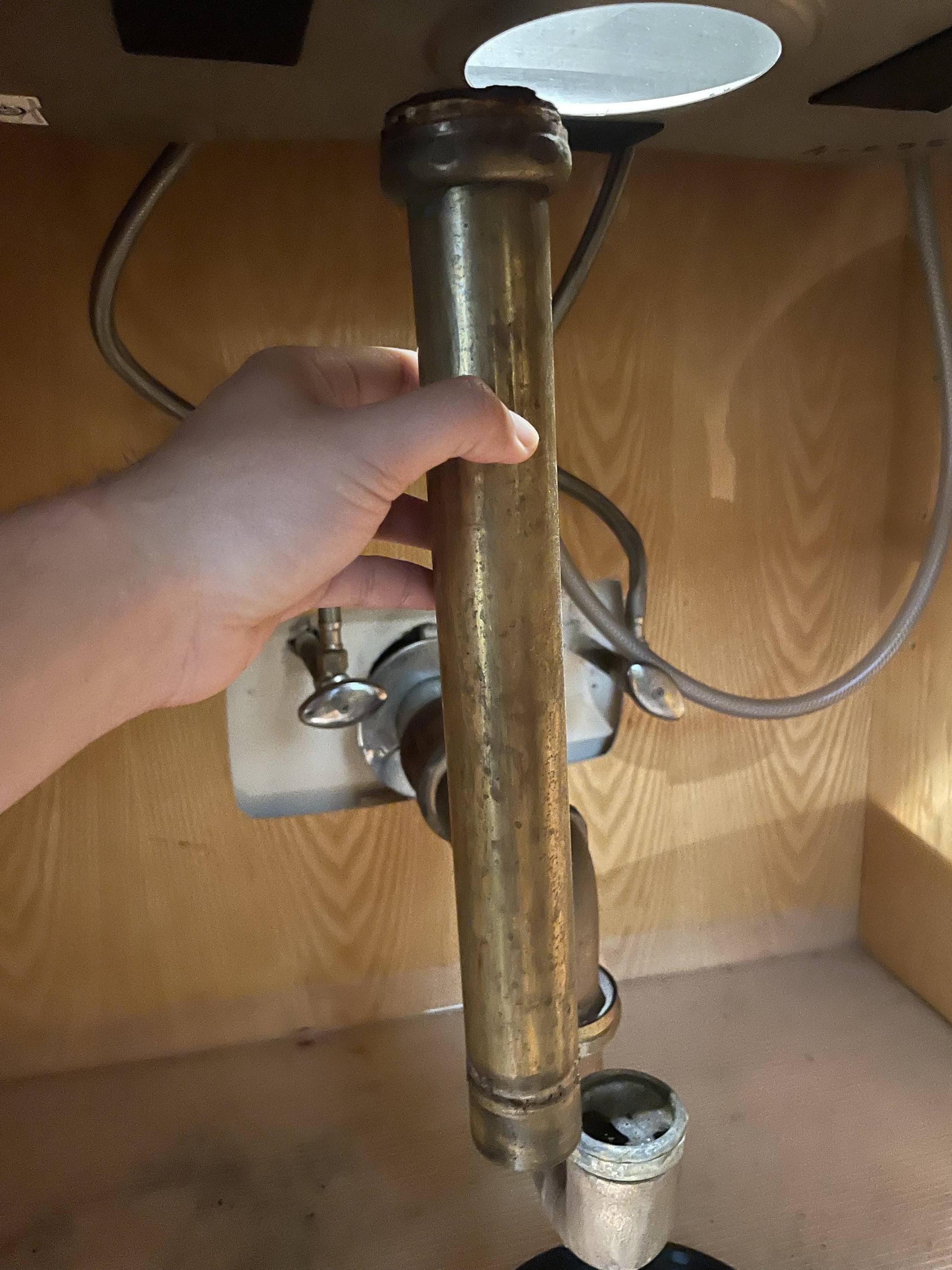 Rusted kitchen basket strainer, mystery plumbing under the sink Home